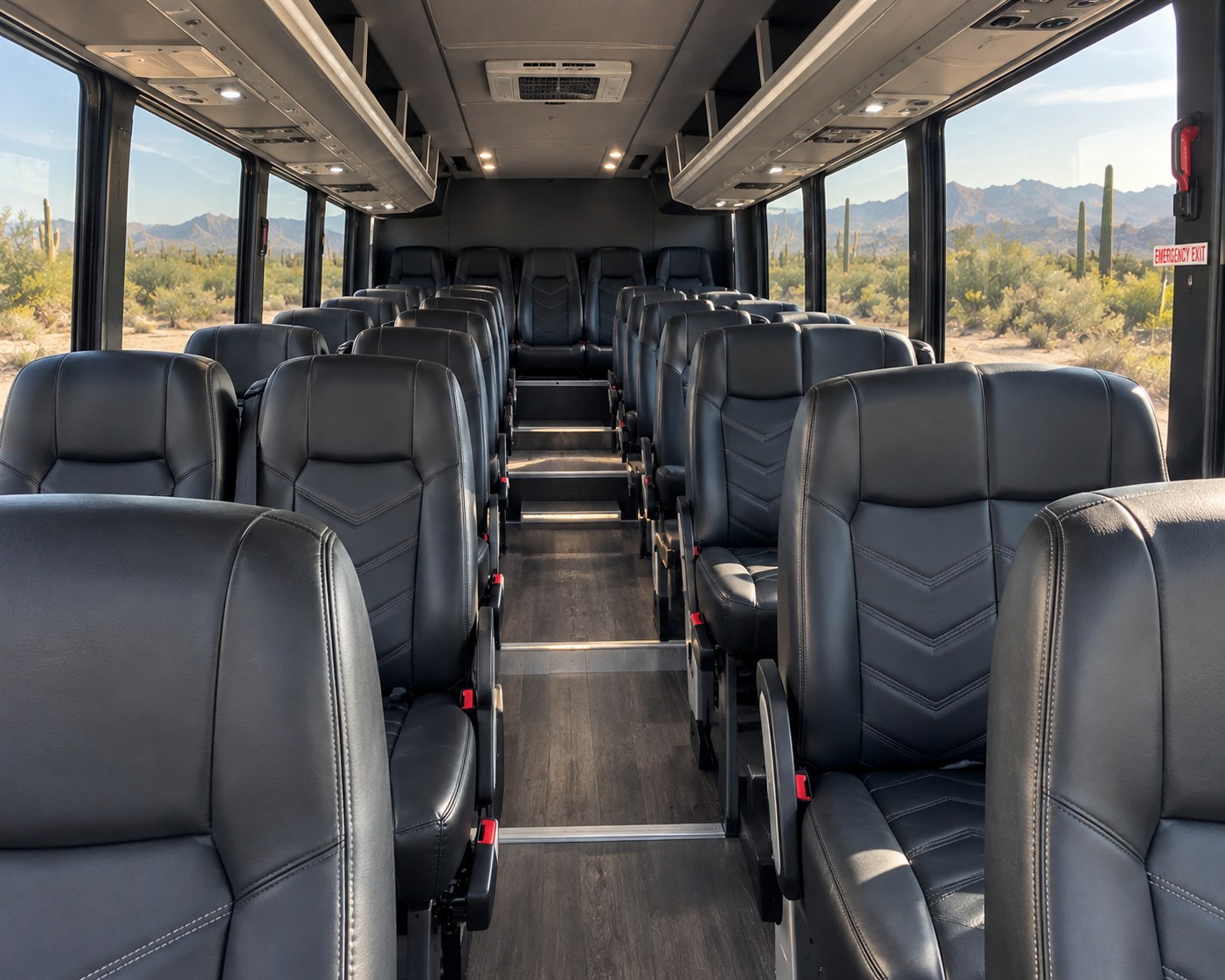 Premium shuttle interior with individual black leather passenger seats.