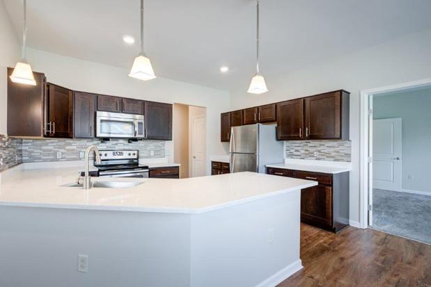Images The Marquis at the Woods Apartments & Townhomes