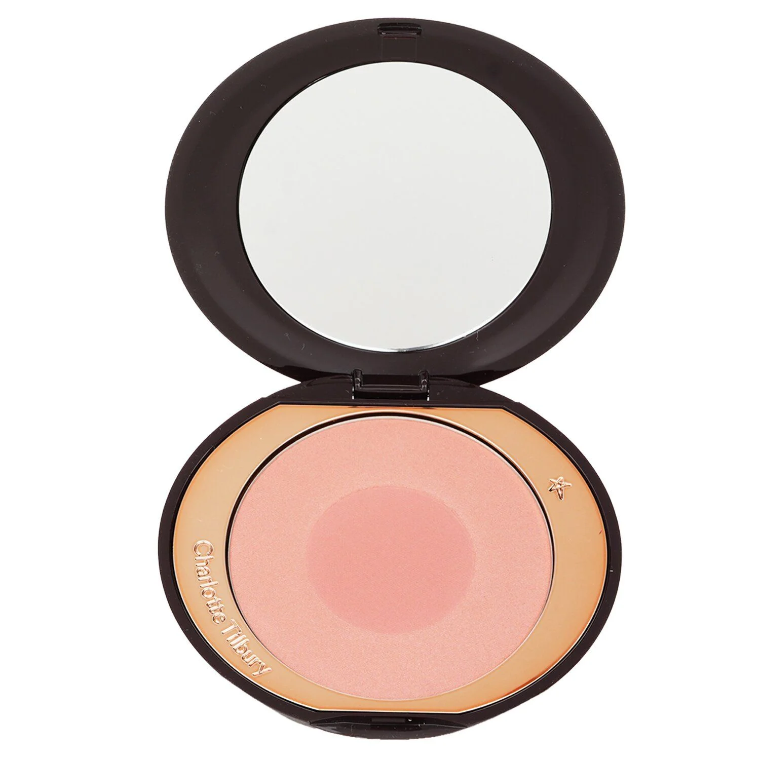 A Charlotte Tilbury blush compact is open, revealing a peachy-pink powder. The compact has a dark brown exterior with a gold-toned trim. The lid is open, showing a mirror. The product is a pressed powder blush, with a subtle sheen and a central darker circle indicating the pressed powder.