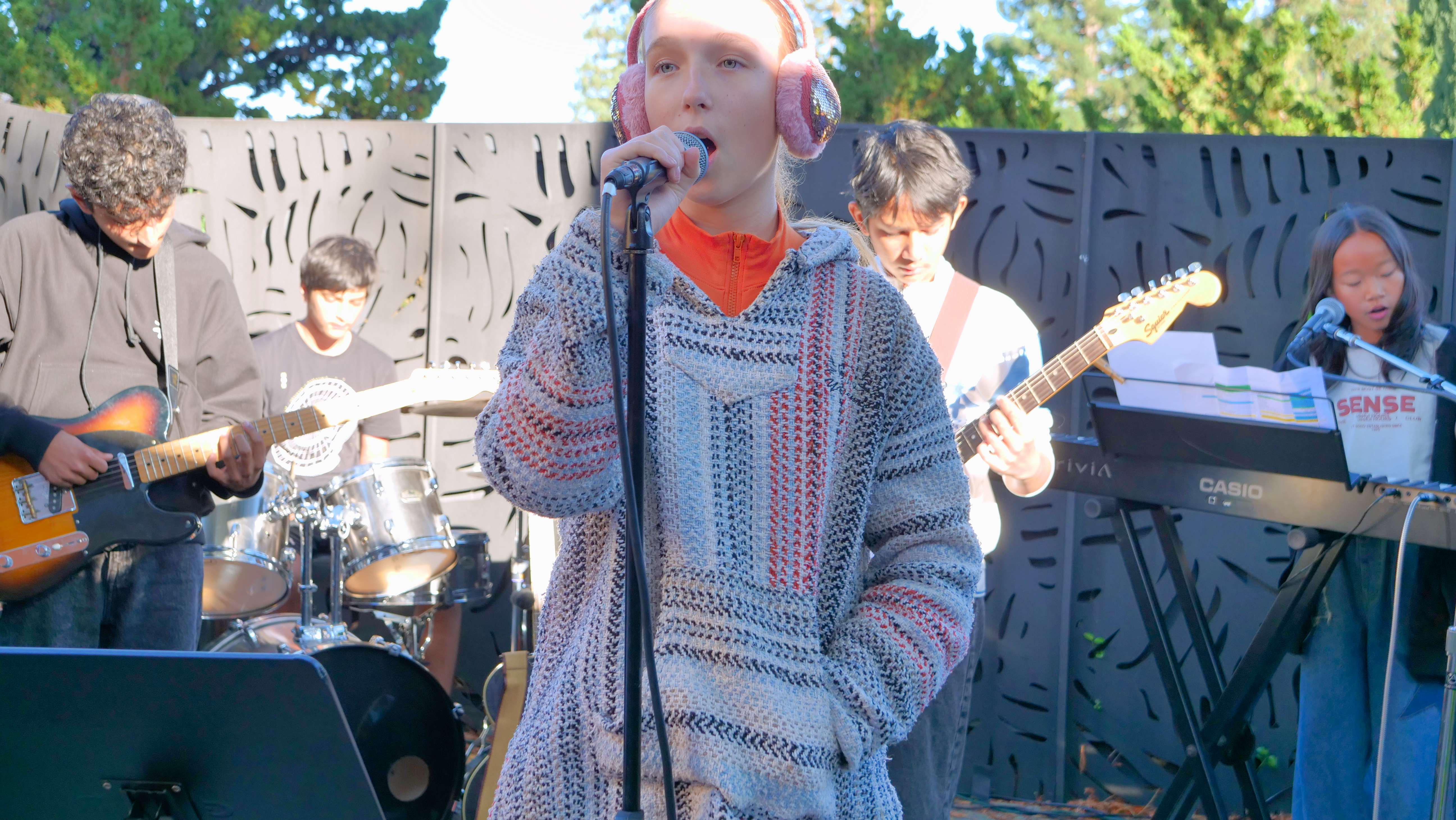 Outdoor student band performance showcasing beNatural Music’s live music training and performance-based music lessons.