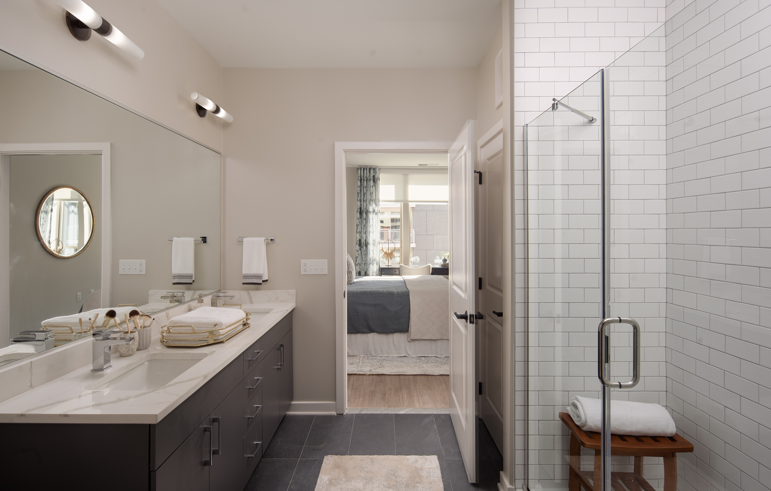 Quartz countertops with large format tile flooring