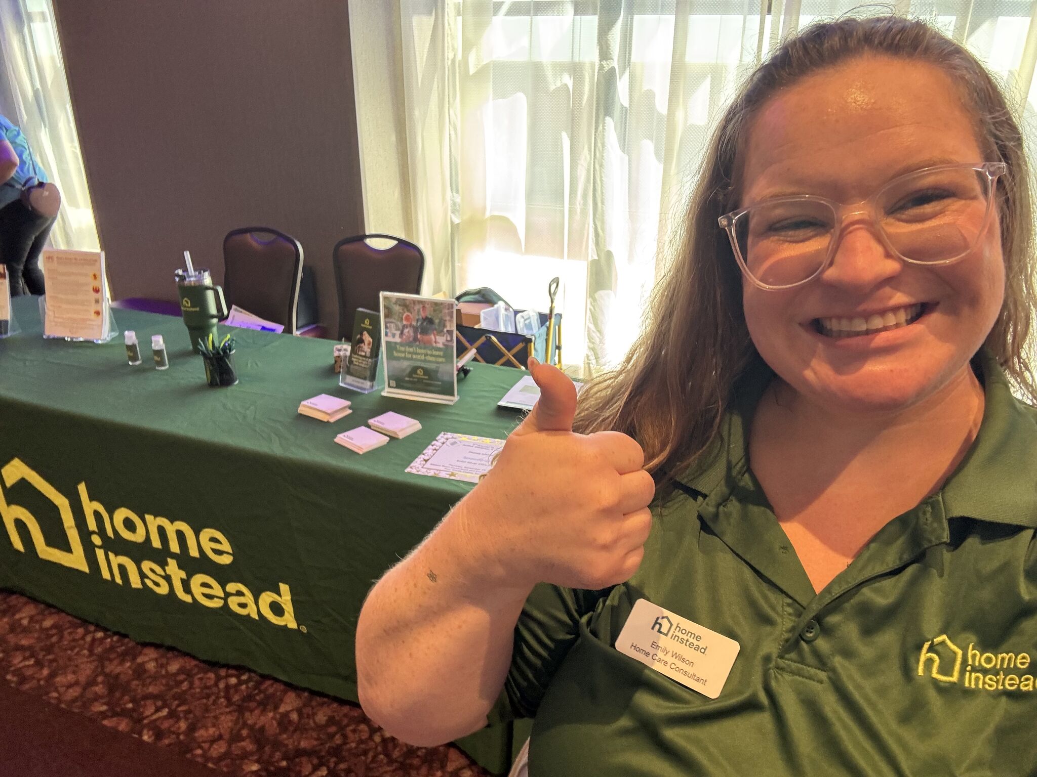 Home Instead team member supporting community outreach and education for families.