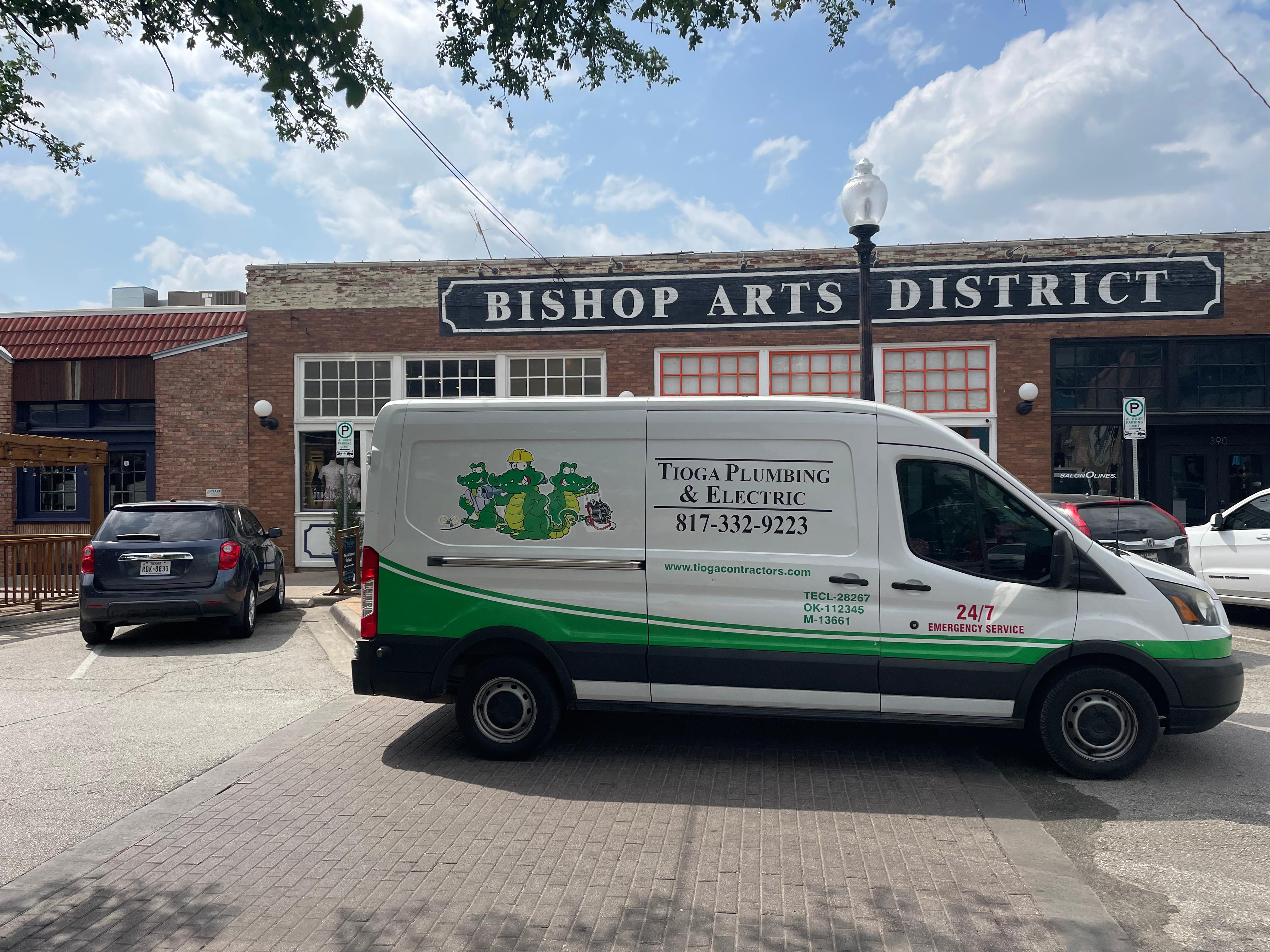 One of the Tioga Plumbing & Electric service vans at Bishop Arts District in Dallas Texas.