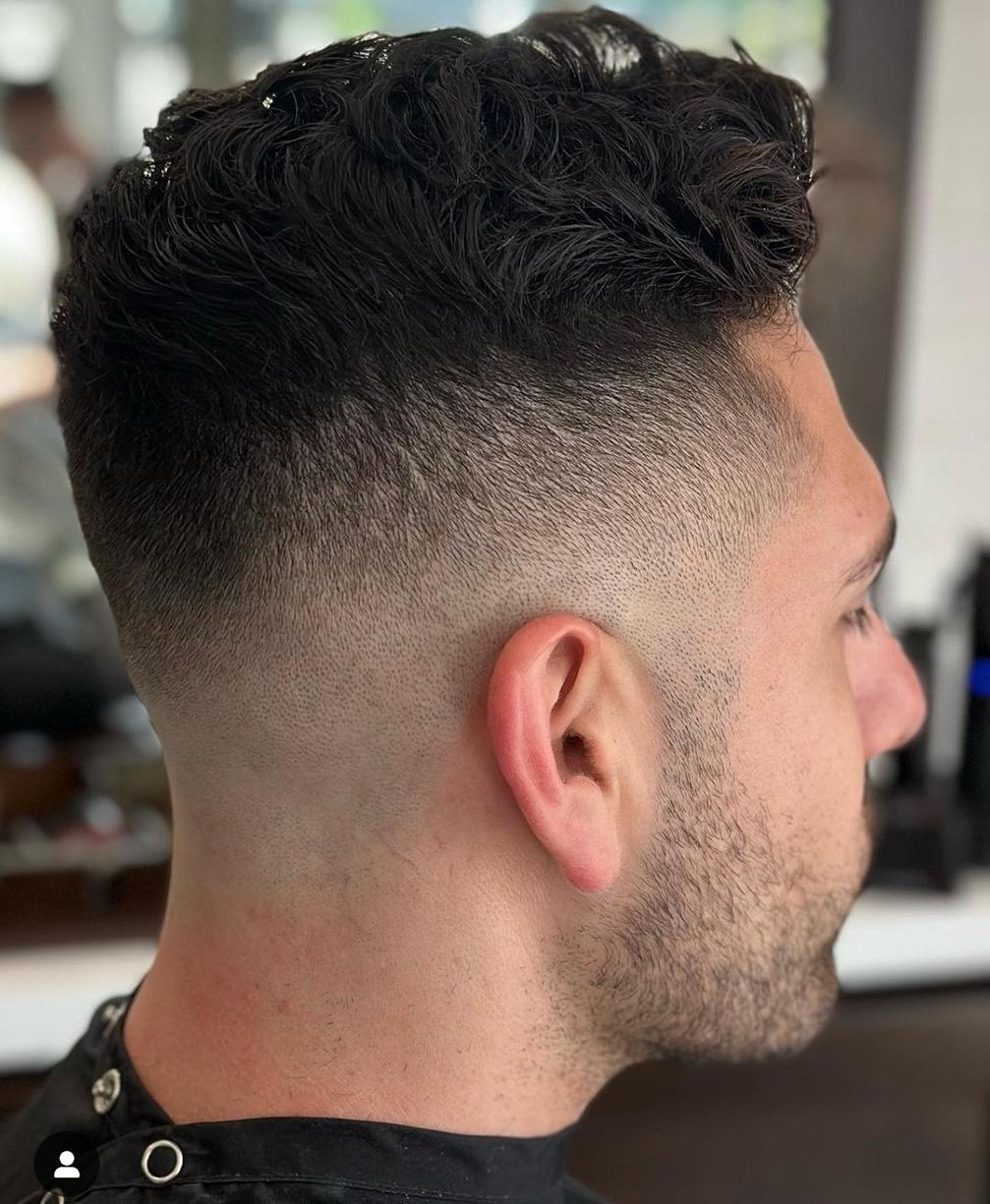 Mid Skin Fade Haircut with Length on Top