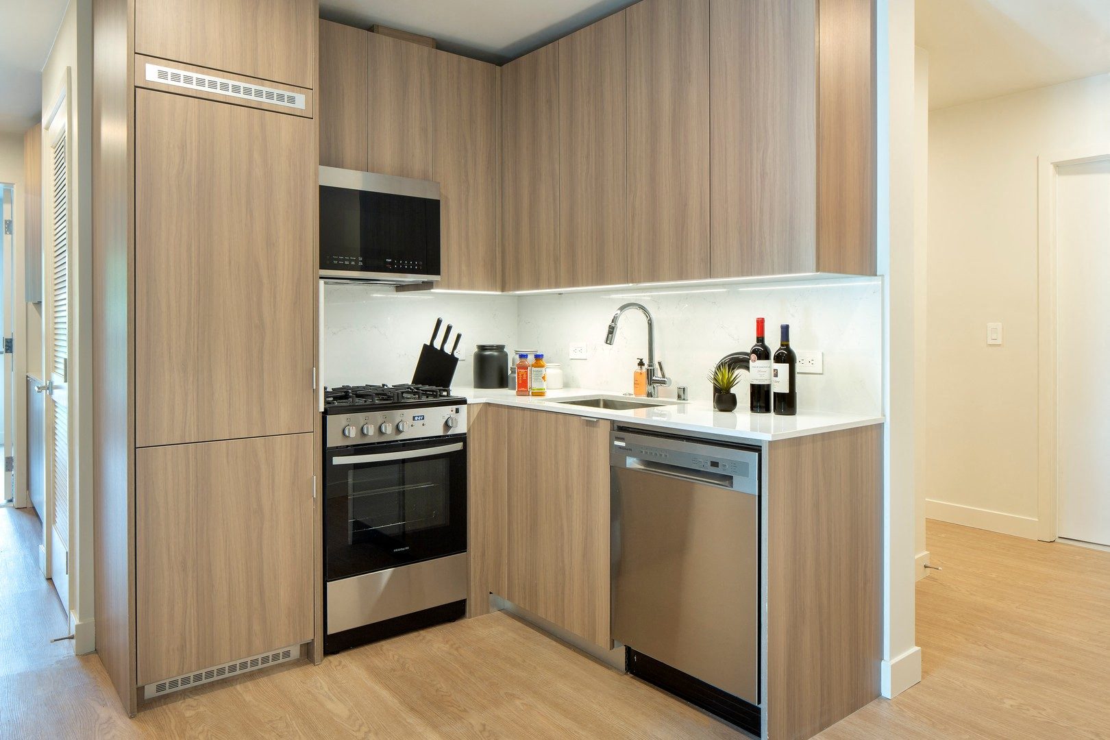 a kitchen with a stove and a sink