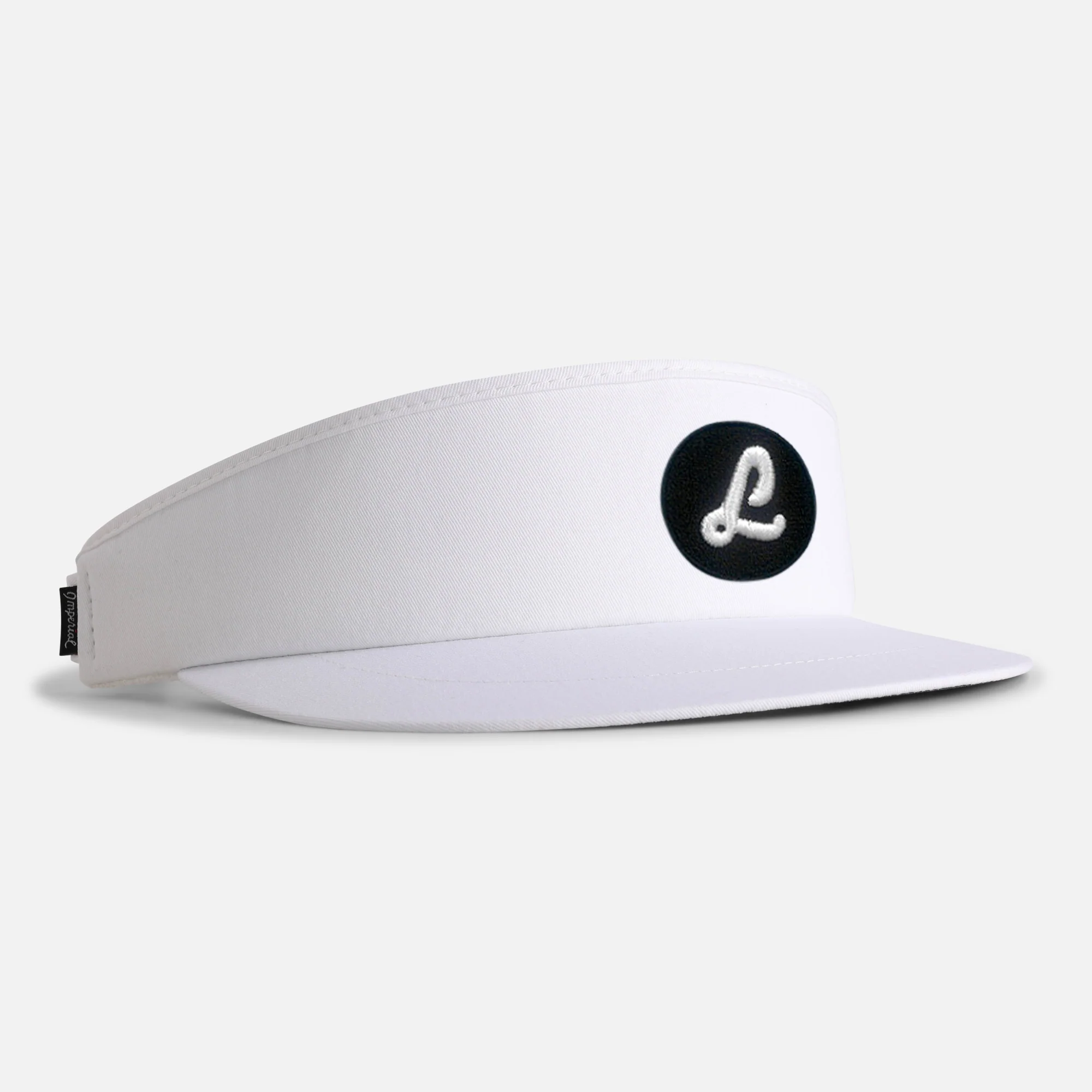 Tour Visor&reg; in white with a monogram in 3D puff embroidery, which stands proud of the fabric rather than lying flat.