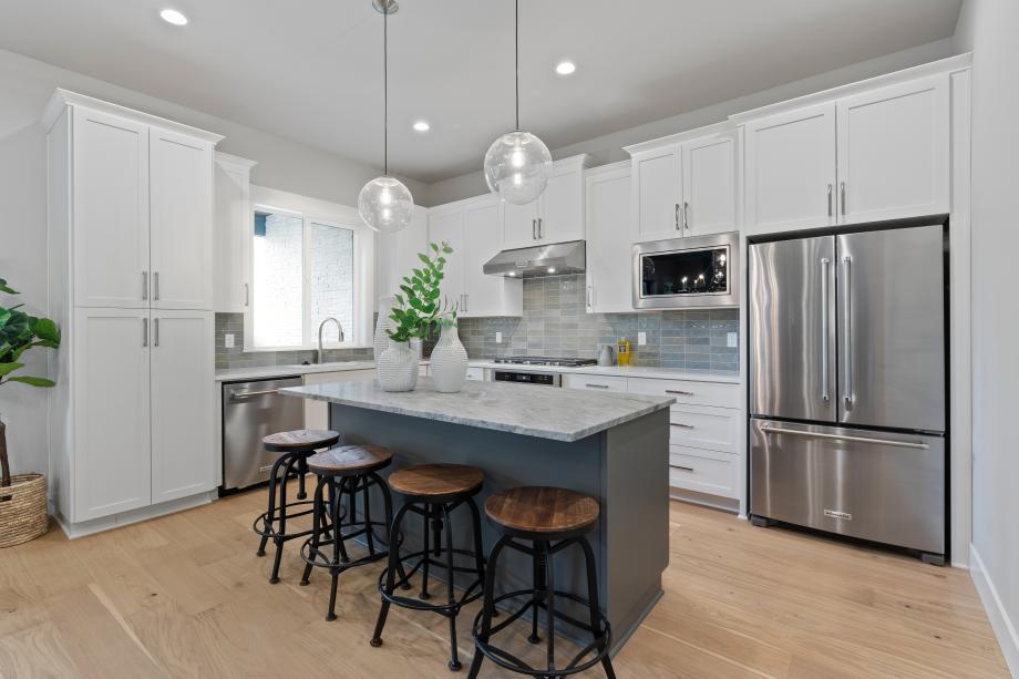 Well-appointed Bandon kitchen boasts central island with breakfast bar