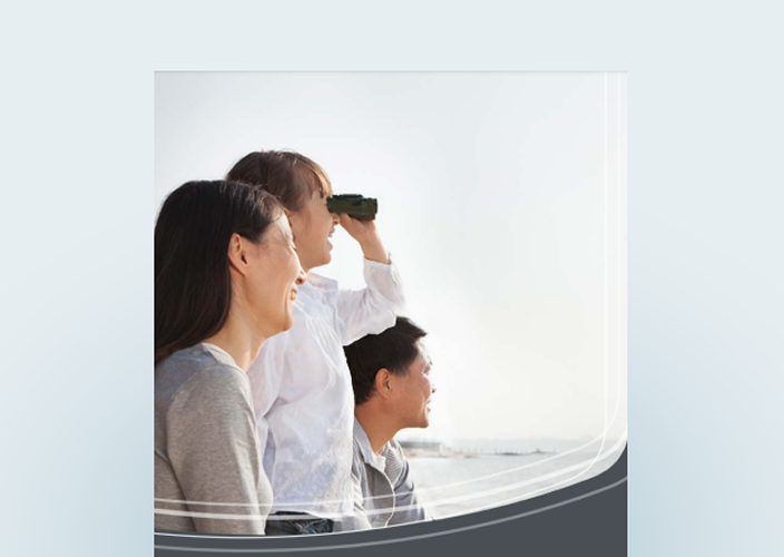 Cover of the estate planning guide with a family using binoculars as they overlook a body of water.