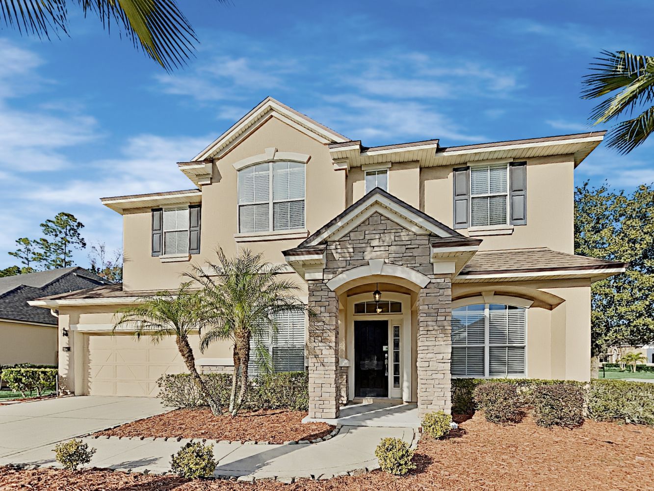 Gorgeous multi-level home with a garage at Invitation Homes Jacksonville.