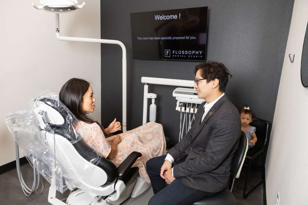 Dr. Matthew Le with patient 