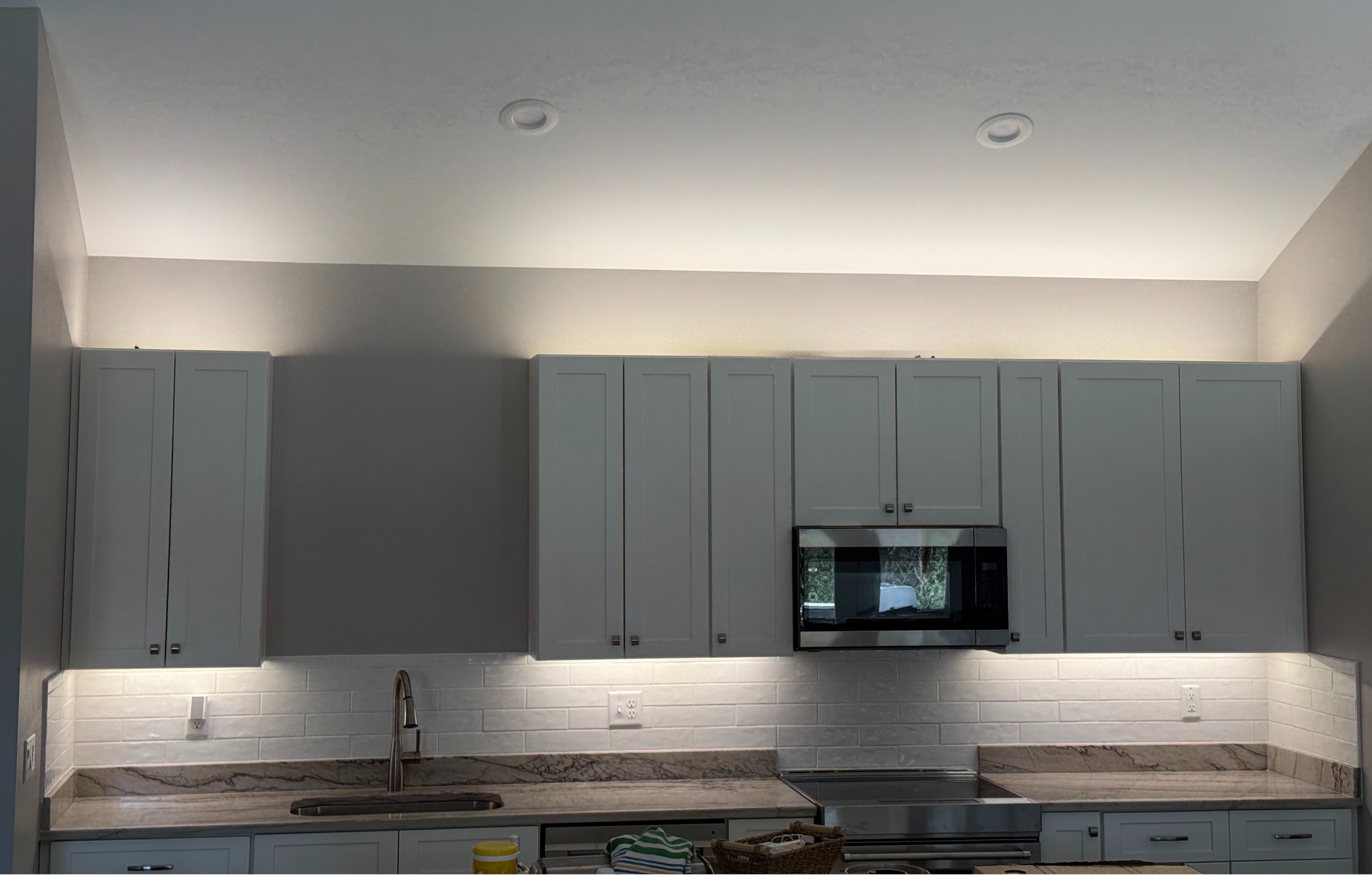 Adding Cabinet lighting and a tiled backsplash can change how your kitchen feels as well as the look. This upgrade can be done in roughly 1-3 days depending on the layout.