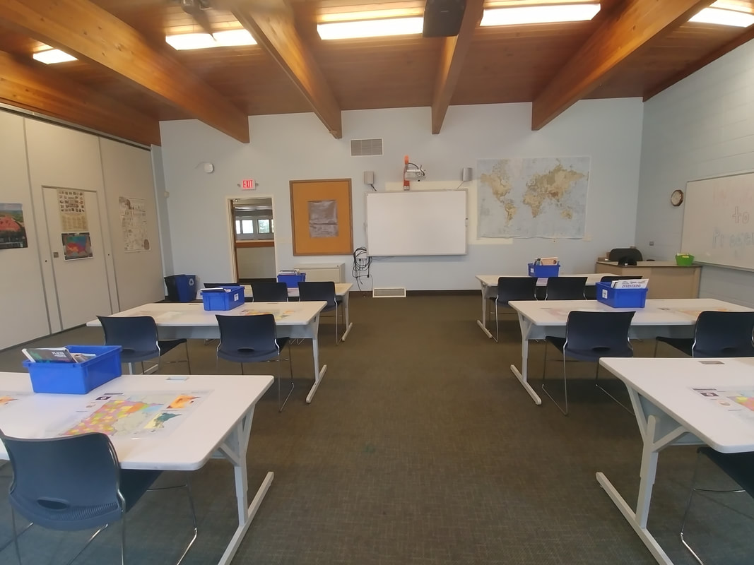 This bright and organized classroom at Progeny Academy provides a welcoming environment where K-8 students can engage in focused learning and collaborative activities. Equipped with modern instructional technology, flexible seating arrangements, and dedicated learning stations, the classroom supports the school's commitment to academic excellence, leadership development, and innovative educational strategies in Brooklyn Center, Minnesota.