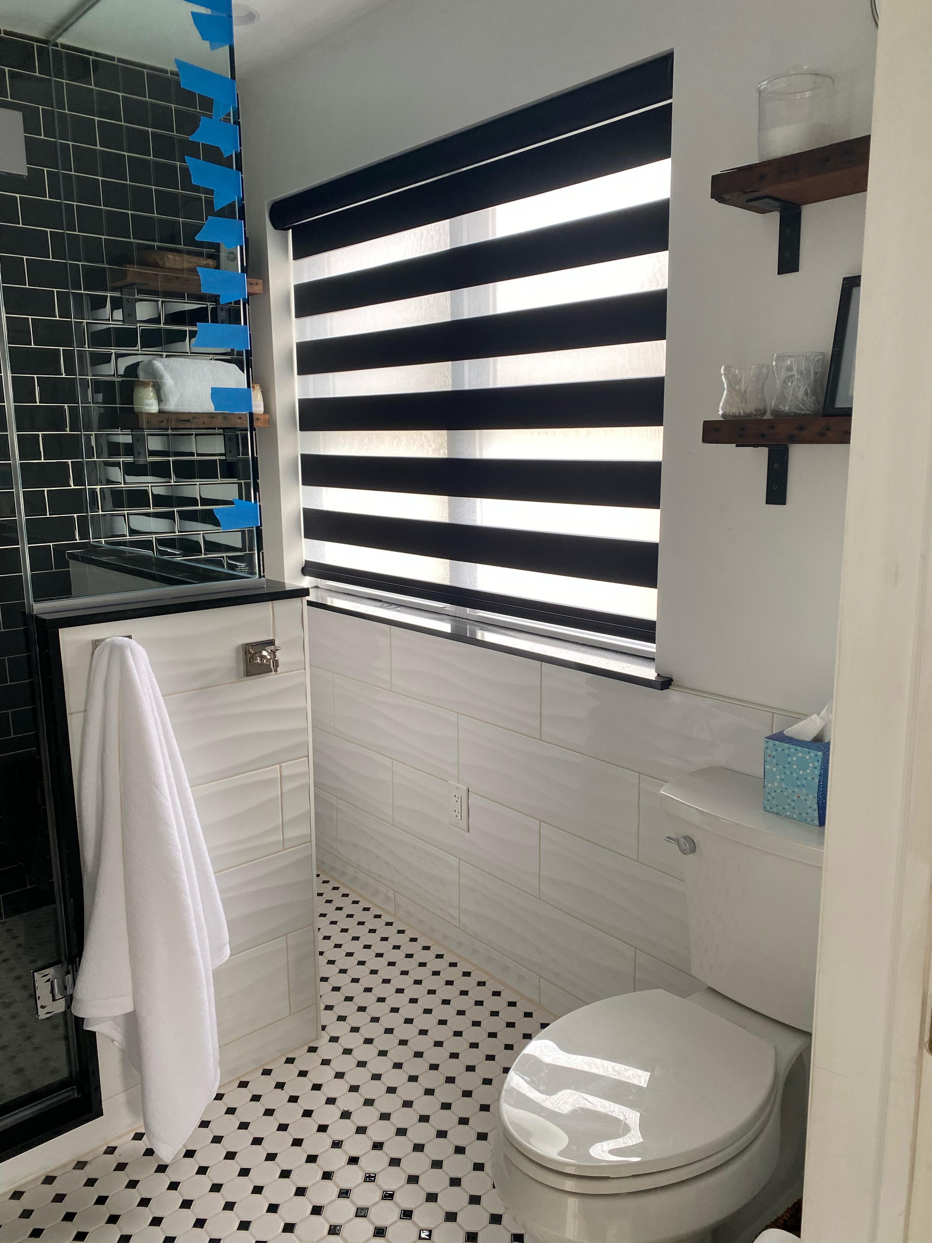 Sheer shades offer the perfect level of privacy for your bathroom!