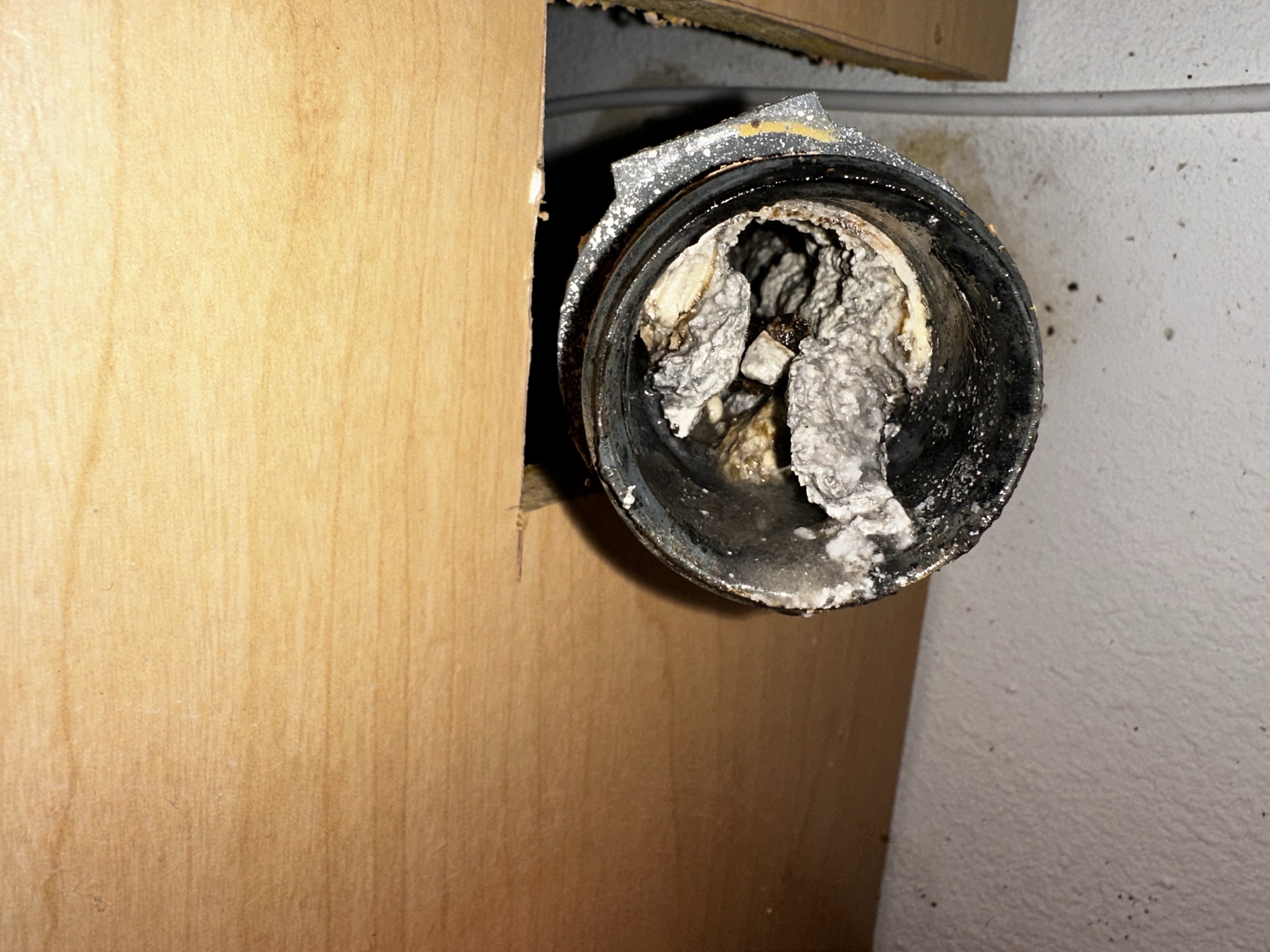 Grease in kitchen sink drain line. Never flush hot grease down your kitchen drainline.