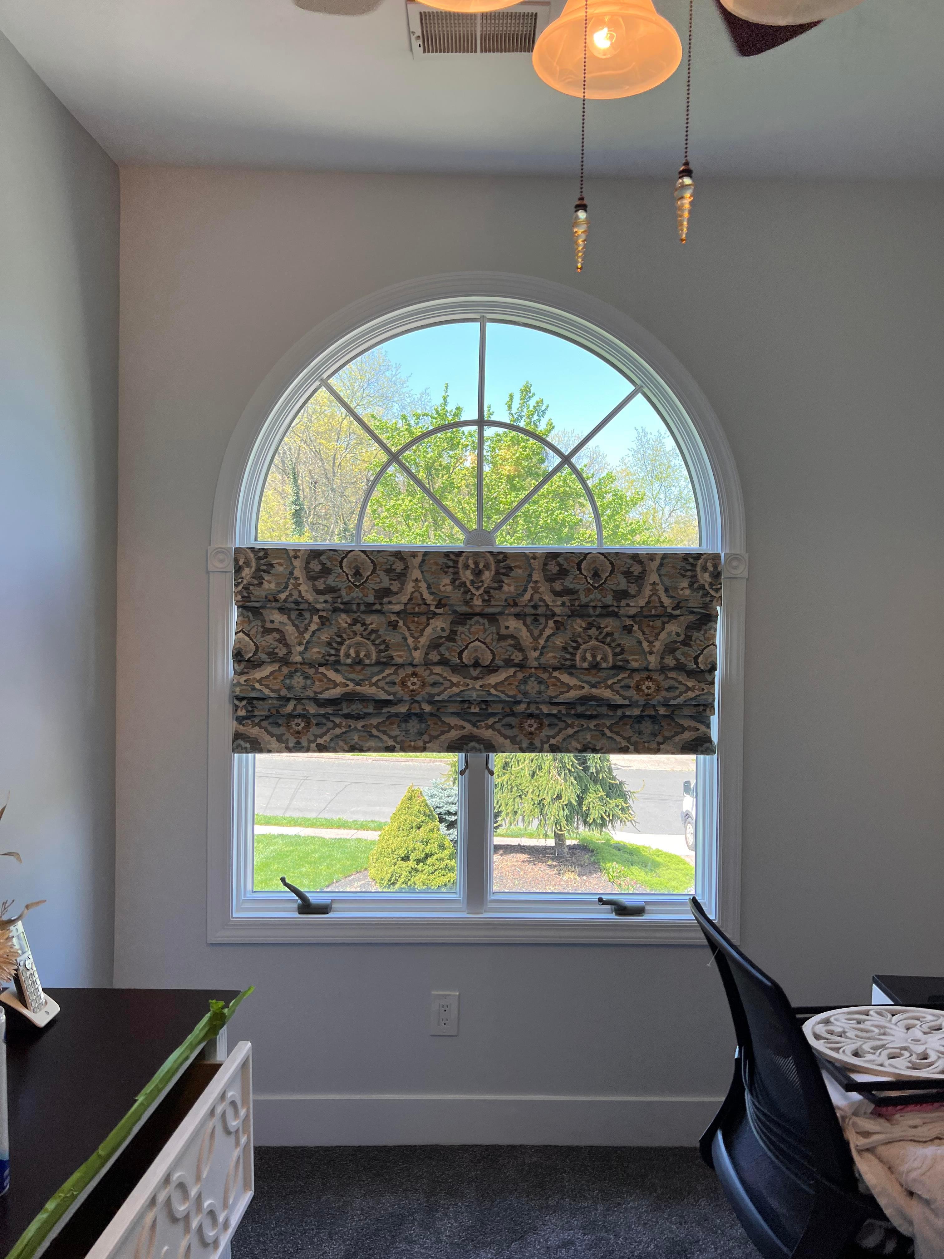 So many fabrics to choose from for Roman shades! Roman shades are perfect for arched windows!