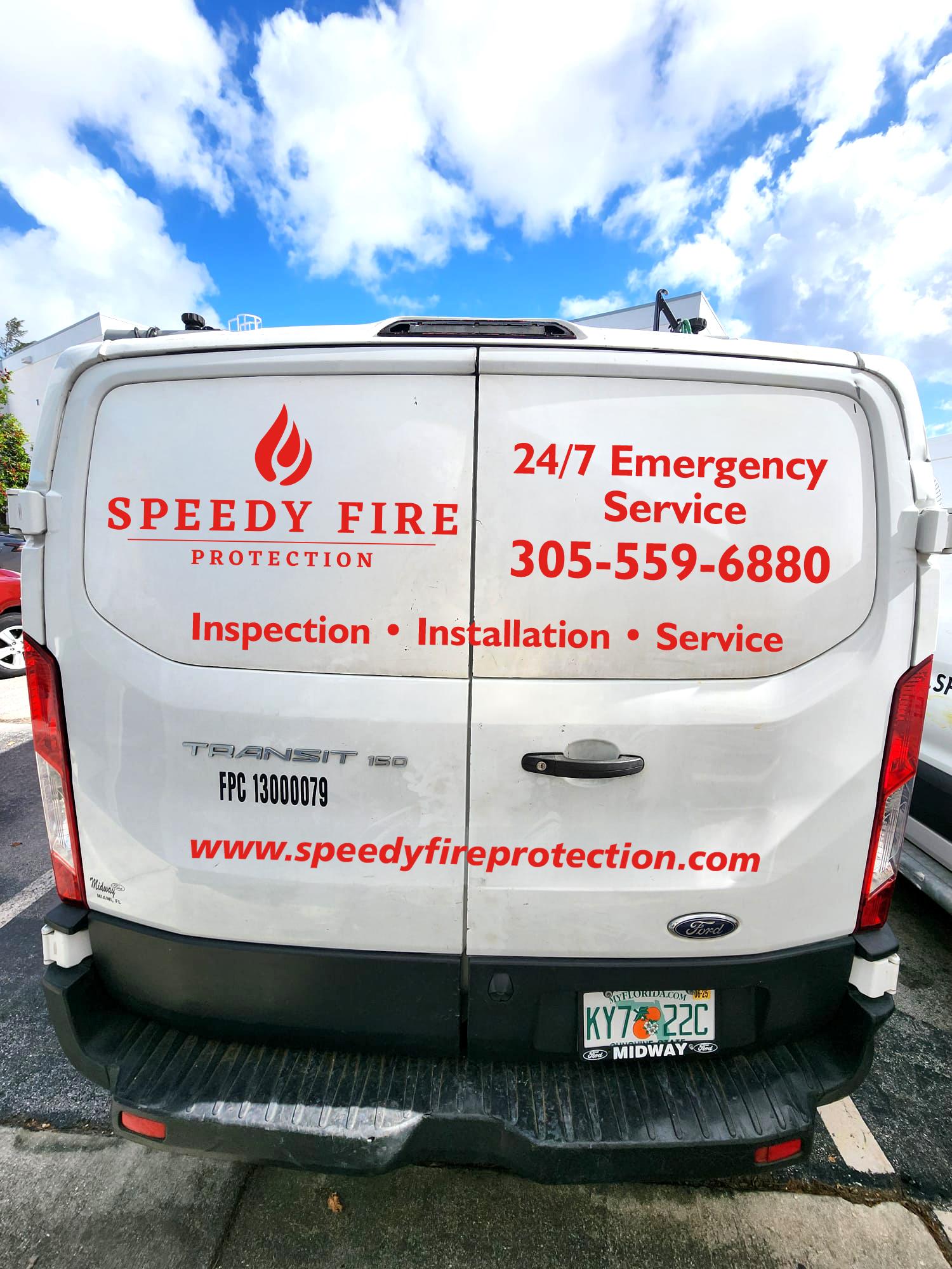 Speedy Fire Protection Ford Transit van displaying 24/7 emergency service number 305-559-6880, company logo, and services offered: Inspection, Installation, Service, with website speedyfireprotection.com