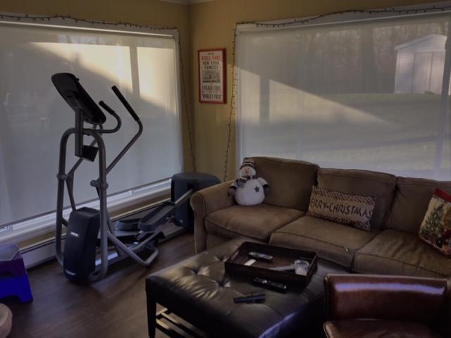 Solar Shades by Budget Blinds of Ossining allow you to cool your home by protecting you from heat and harsh rays, while still allowing you to enjoy natural light from the great outdoors! #WindowWednesday #BudgetBlindsOssining #ShadesOfBeauty #FreeConsultation #BriarcliffManorLivingRoom