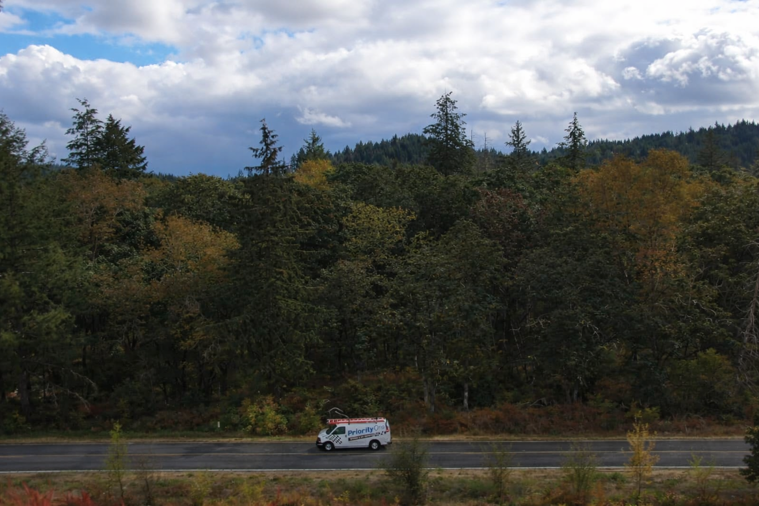 The Priority One van is a familiar sight on wooded Oregon roads as we drive to service calls in places like Fall Creek, Lowell, Marcola, and Cottage Grove.