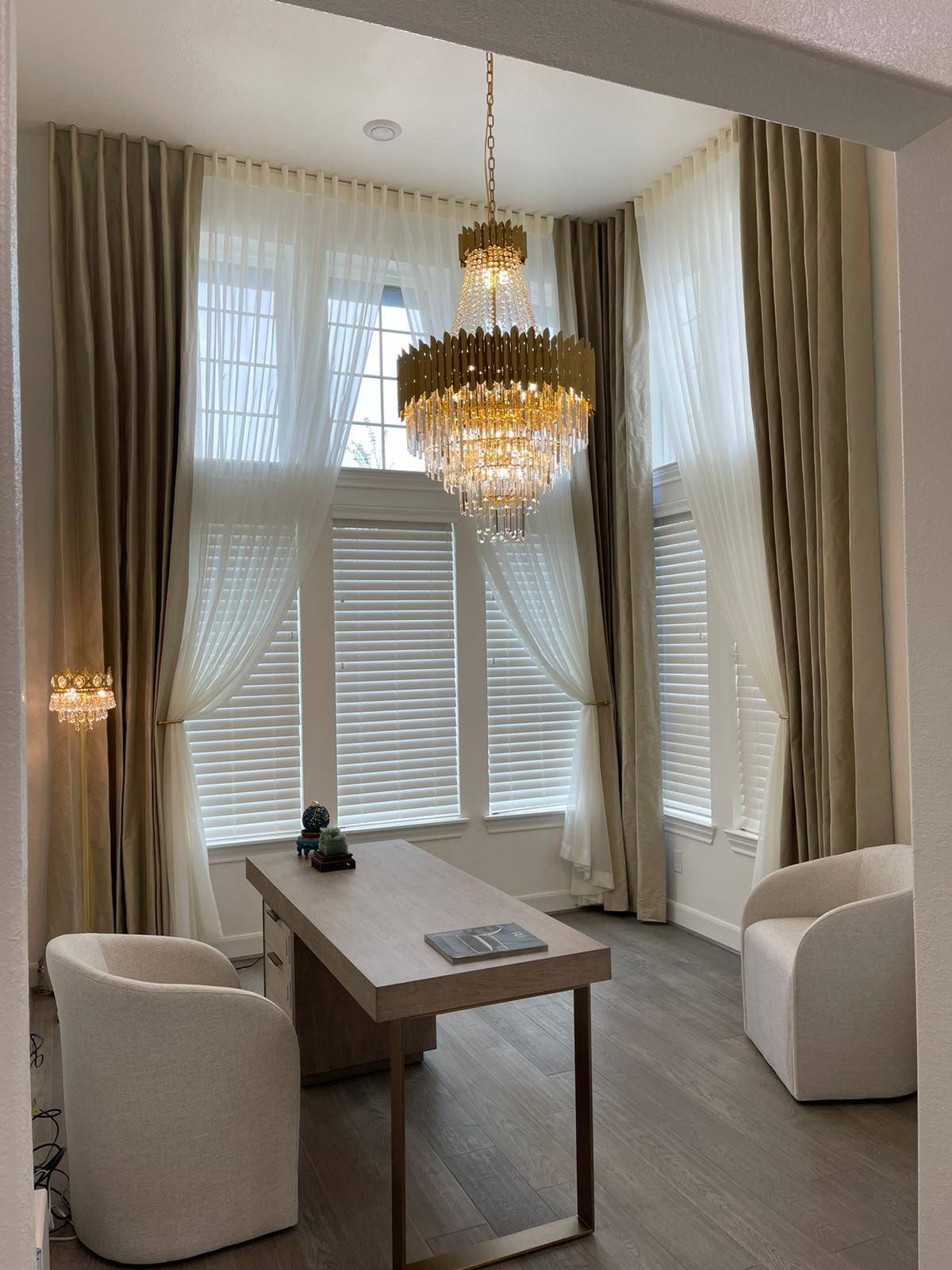 This Sugar Land home is the height of elegance! We wanted to keep the look simple but beautiful. That’s why we went with these gorgeous Draperies and Wood Blinds!