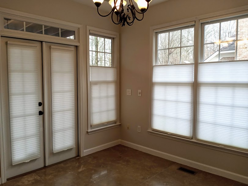 Top down cellular (honeycomb) shades are the perfect solution for maximum light and privacy control. You can adjust the amount of window that is covered by the shade from either the top or the bottom. Great for when you want to let in more natural light but still maintain privacy