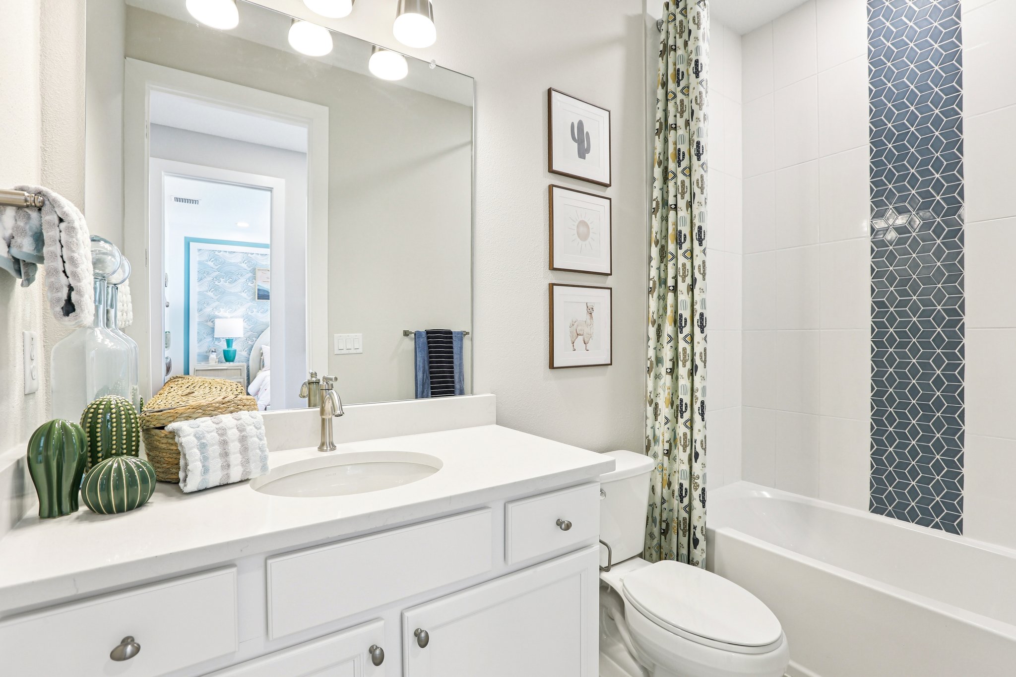 The Second Bathroom of a DRB Homes Bimini Home Plan at Isla Mirada in San Antonio, FL. 