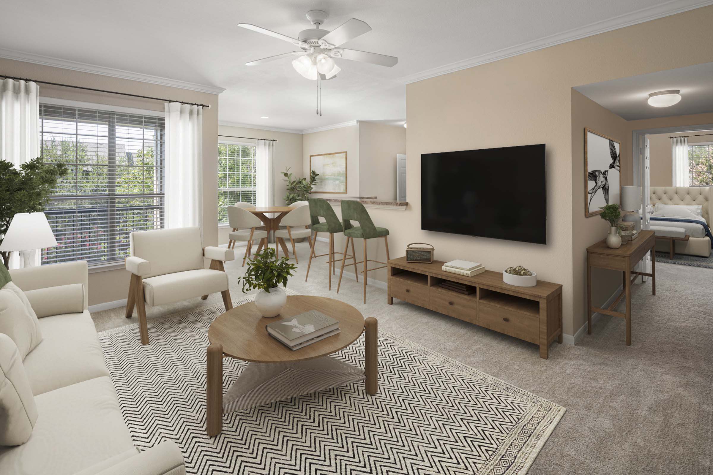 Living room and dining room with carpet at Camden Buckingham apartments in Richardson, Tx 