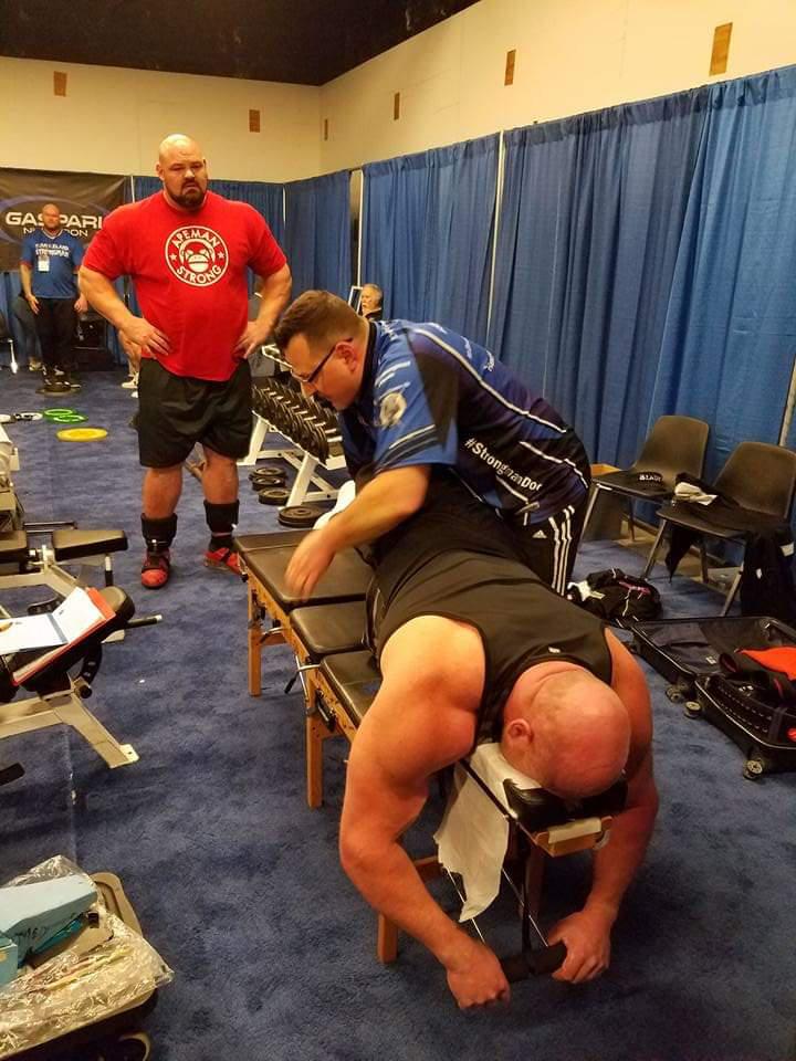 4x World Strongest Man Champs waits his turn while Dr. McDougle finishes up with Canadian strongman champion J.F. Caron.
