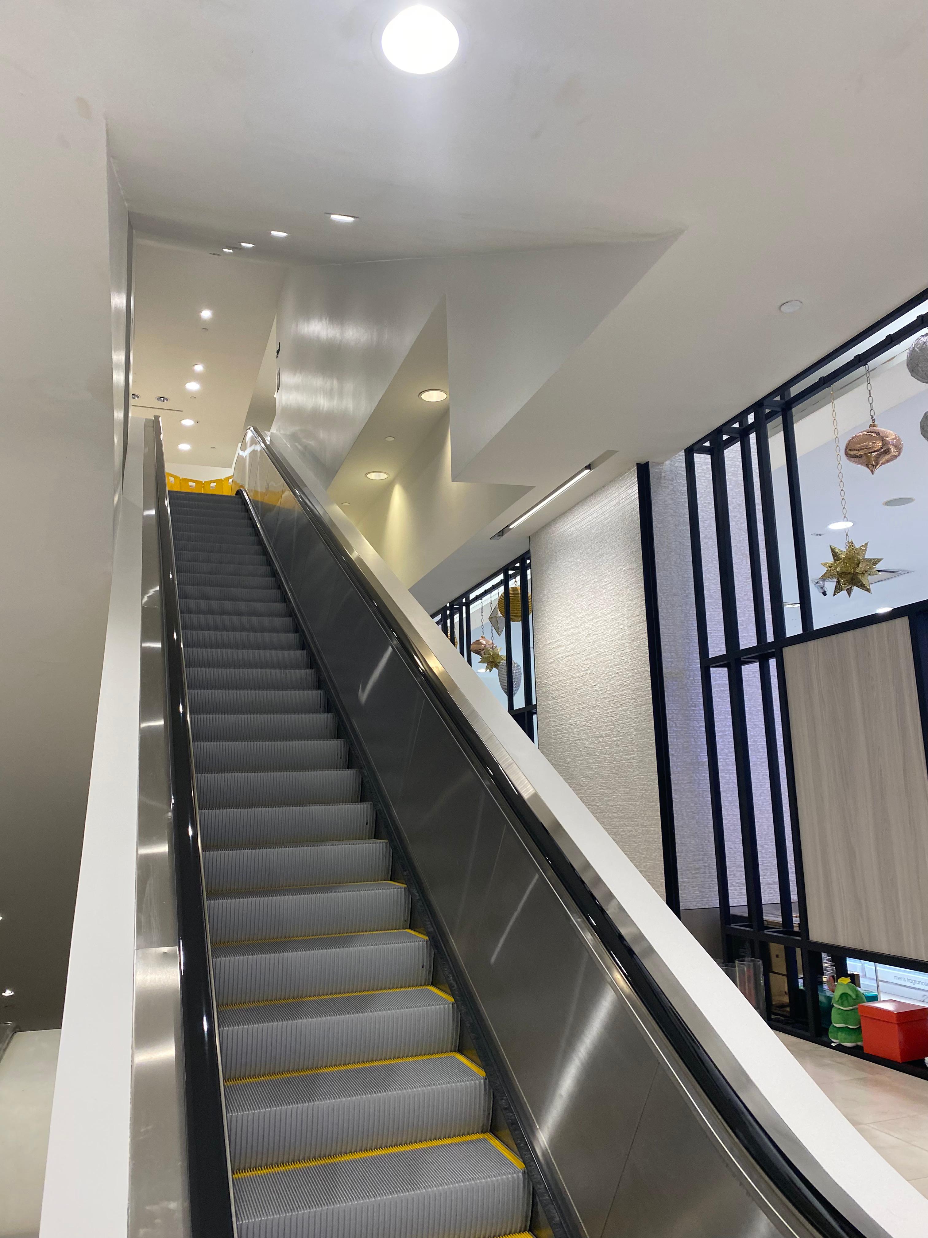 Macys San Francisco Painting walls for new escalator installation