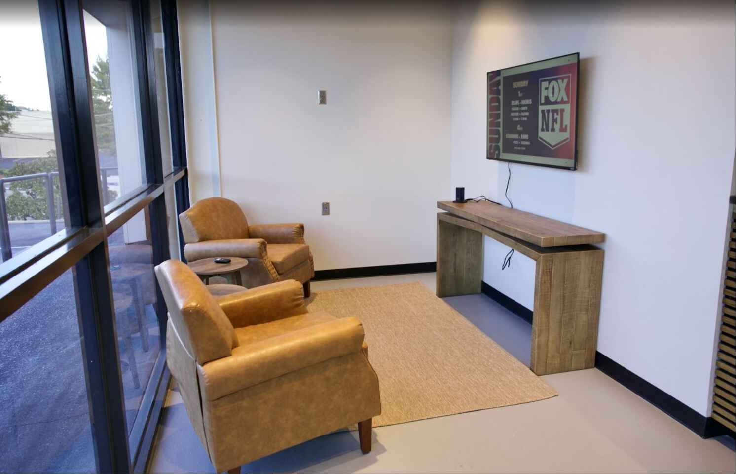 Customer lobby and waiting area inside Rob’e Mans Domestic Auto Repair facility in Homewood, Alabama featuring comfortable seating, clean modern interiors, professional automotive branding, and a welcoming environment for customers waiting on Domestic vehicle repair and maintenance services. The waiting area reflects the company’s commitment to professional customer service, honest automotive care, and a comfortable experience for drivers throughout Birmingham and Central Alabama.
