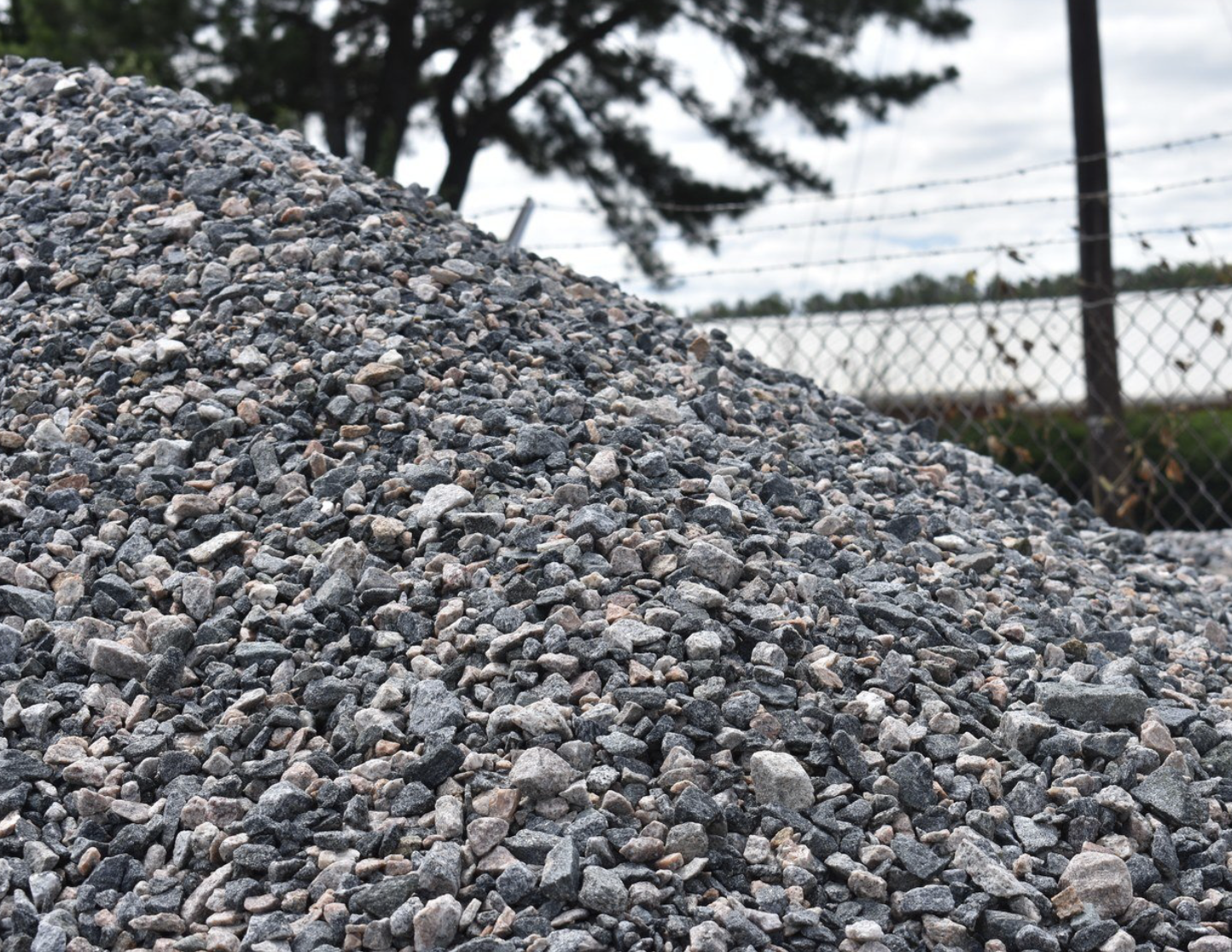 #57 Stone or Wash stone in Bulk.
Made from high-quality gray limestone for lasting durability and a natural finish.
Provides excellent drainage to reduce water buildup and erosion.
Helps stabilize soil and prevent washouts in heavy rainfall areas.
Bulk size offers cost efficiency and easy coverage for large areas
Uniform size and texture ensure smooth compaction and even distribution
Ideal for use in driveways, retaining walls, and pipe bedding applications
Bring strength, stability, and lasting performance to your landscaping and construction projects with Youngquist Brothers Bulk #57 Stone. This durable gray limestone aggregate offers the perfect blend of form and function — delivering reliable drainage, structural support, and an attractive natural look. Whether you’re building driveways, retaining walls, or pipe bedding, this stone ensures long-term performance while preventing soil erosion and maintaining ground stability. Designed for heavy-duty applications, it’s the go-to choice for both residential and commercial landscapes that demand resilience and quality. Engineered for durability and versatility, the Bulk #57 Stone provides superior compaction and water permeability, reducing washouts and improving foundational strength. Each load delivers consistent size and color for a clean, uniform finish — ideal for enhancing both utility and aesthetics in your outdoor spaces. Built to perform and designed to last, it’s a dependable material that stands up to time, traffic, and the elements.