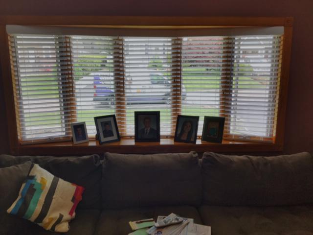 Bow windows can be difficult to work with. There just isn’t space for curtains or other options. That’s why we went with perfectly fitted Wood Blinds for this Hawthorne home!
