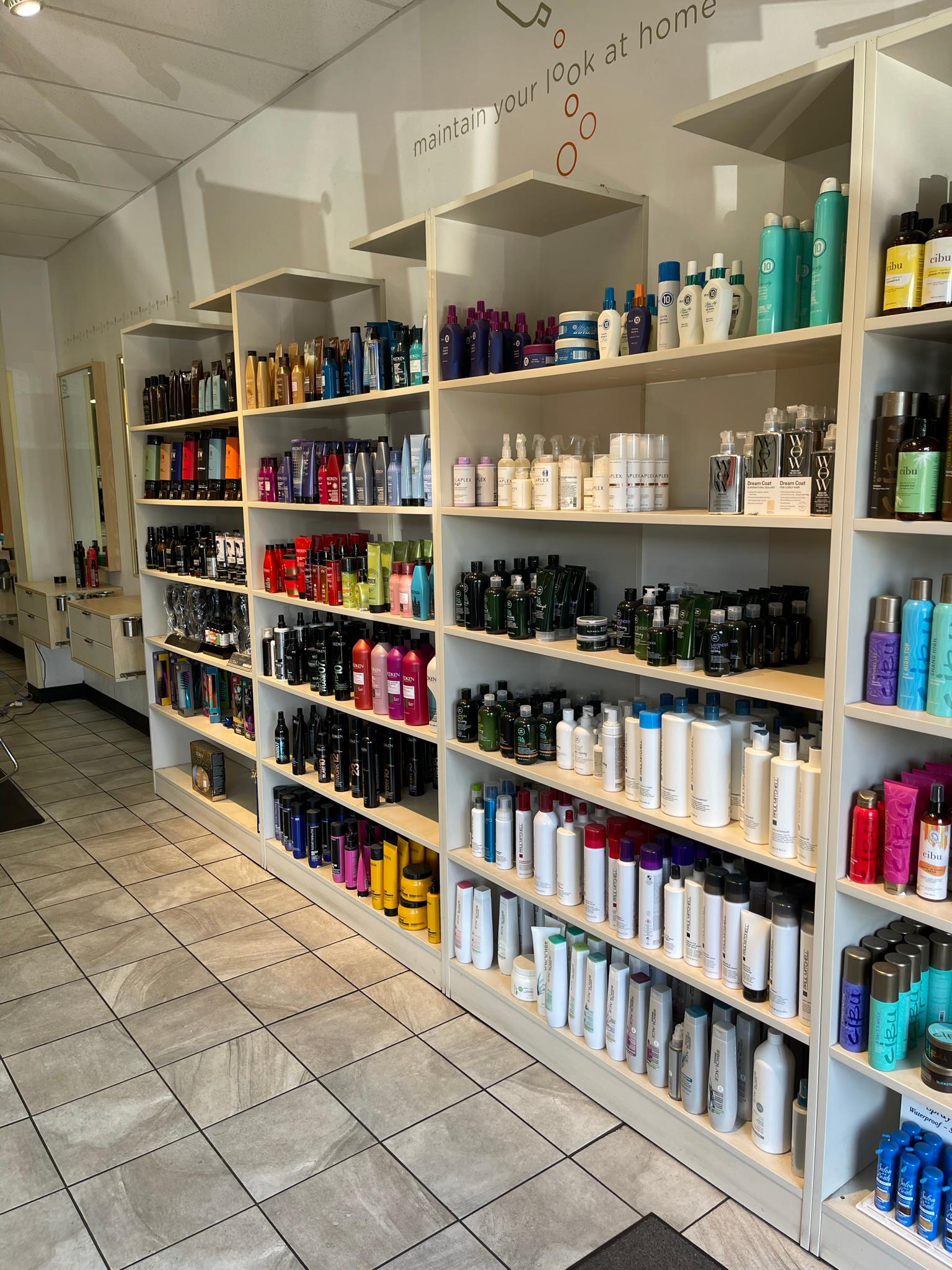 The shelves with products available for purchase at a Hair Cuttery Salon.