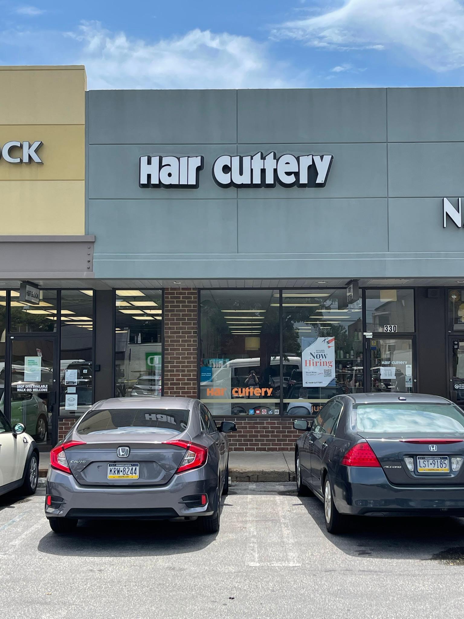 The front entrance of Hair Cuttery at Whitman Plaza.
