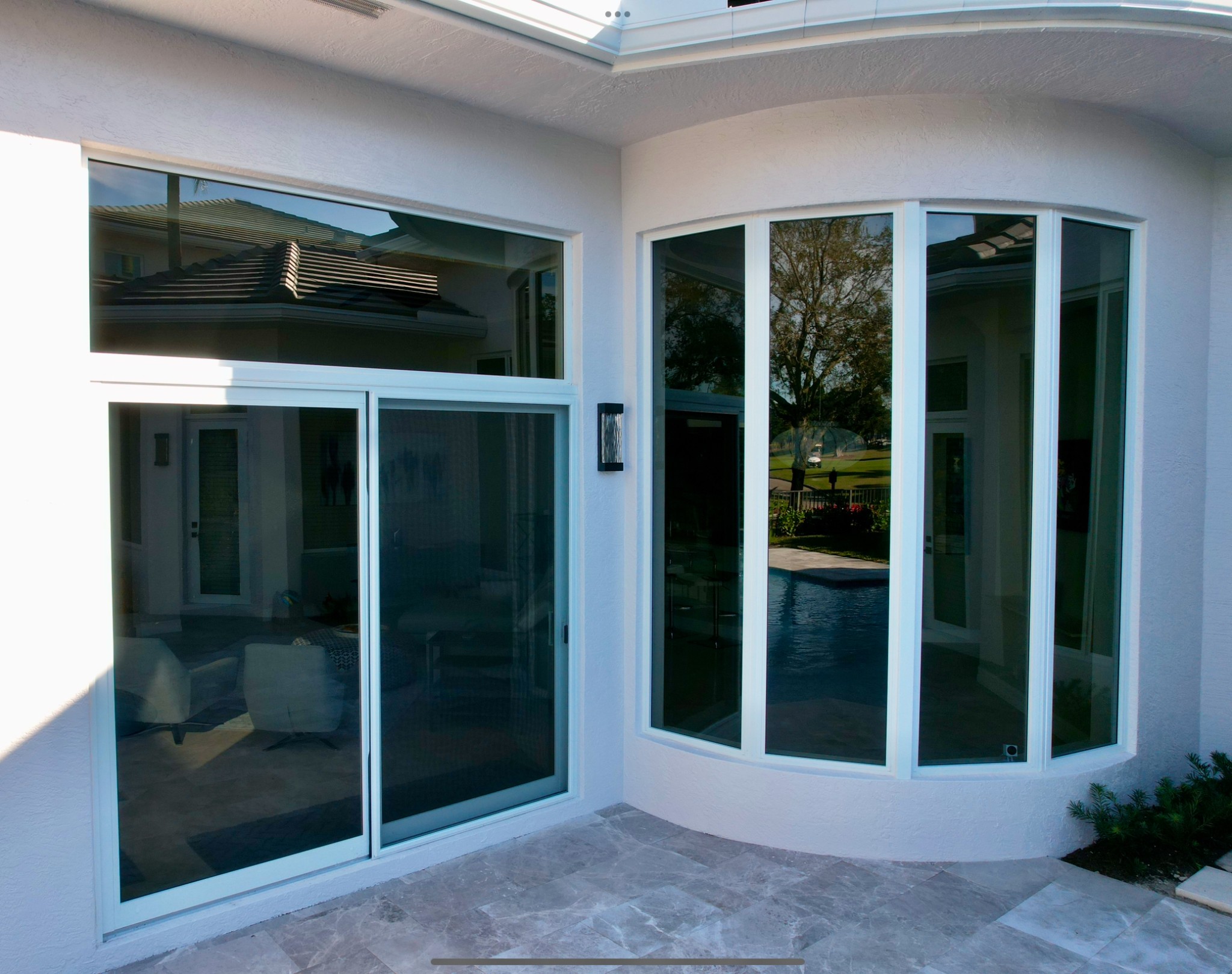 Newly installed PGT impact window and slider.