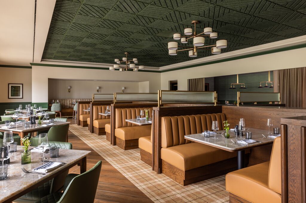Brass, leather, and a ceiling worth craning your neck for. The details are part of the experience.