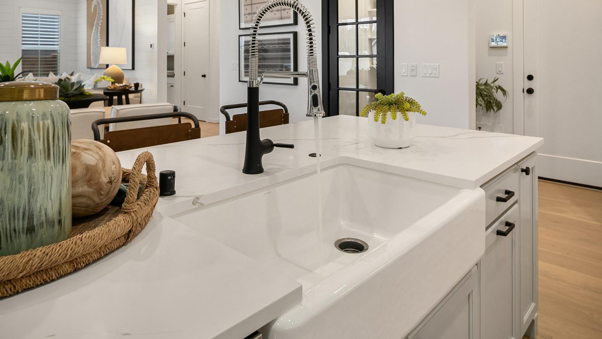 Make design selections such as farmhouse sink or black fixtures at the design studio