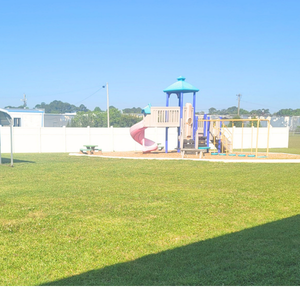 Safe, fenced playground area at Childcare Network where children enjoy active outdoor play
