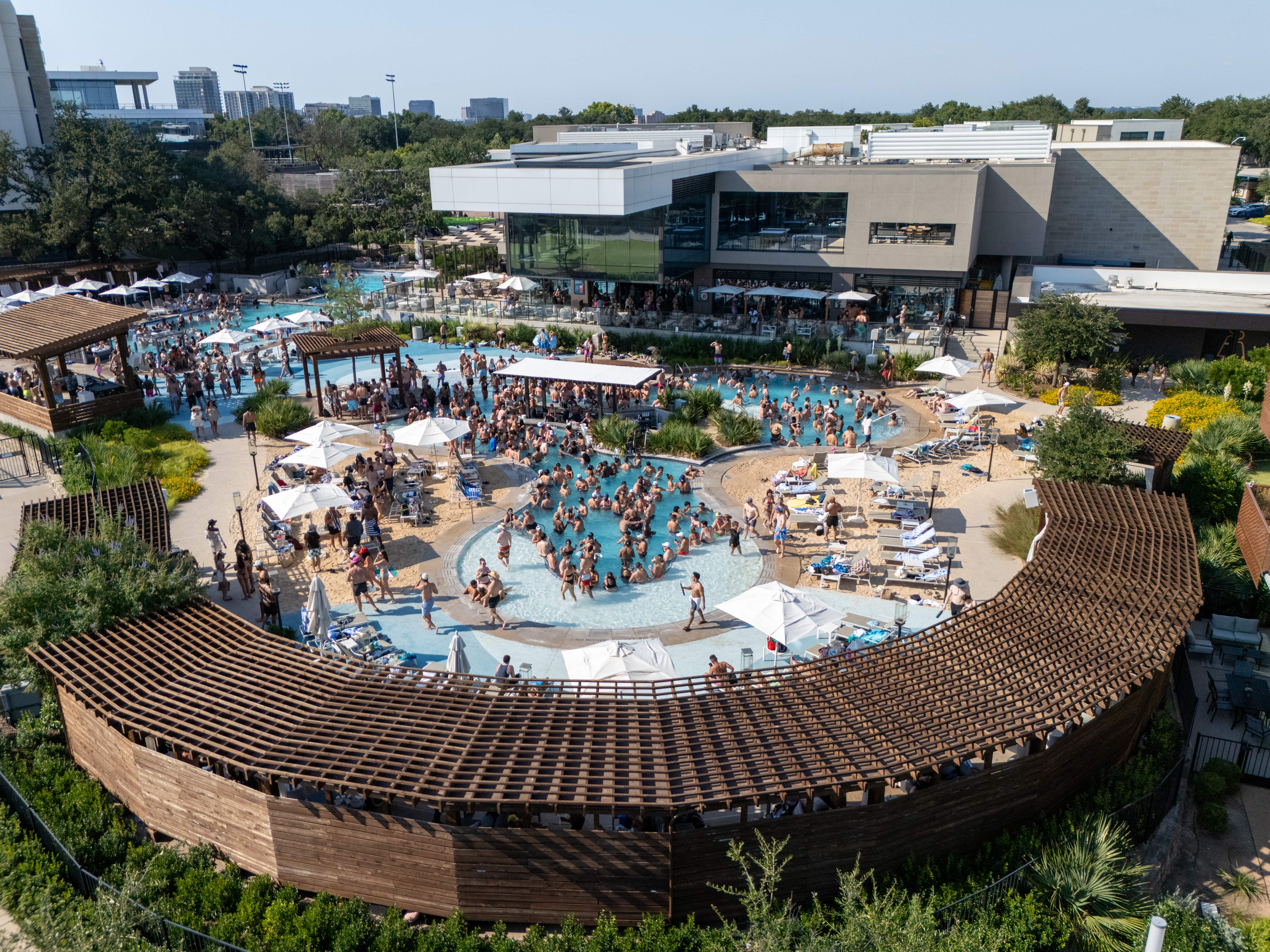 Dallas pool with a resort-style beach club experience