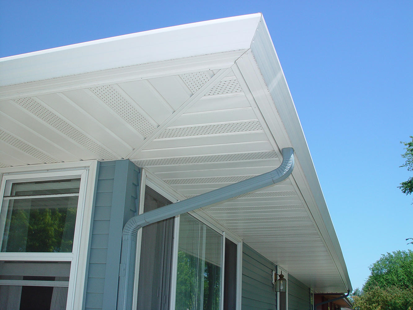 A well-designed gutter system will reduce and eliminate water and ice issues around your home surfaces, greenery and foundation by carrying the rain water away for manageable drainage. ABC Seamless Siding, Gutters and Windows can match and cover your overhang to eliminate difficult painting and upgrade your home's appearance.