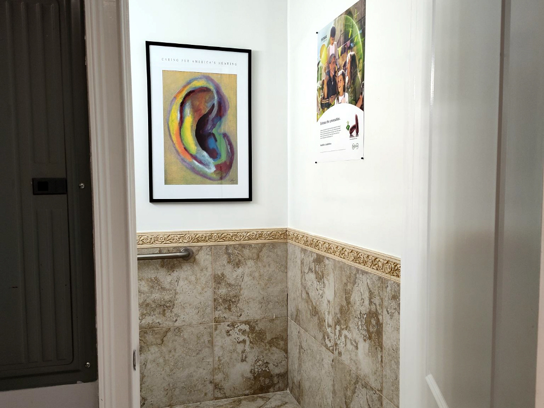 Interior photo of the bathroom for AudioNova hearing clinic in Jupiter, FL