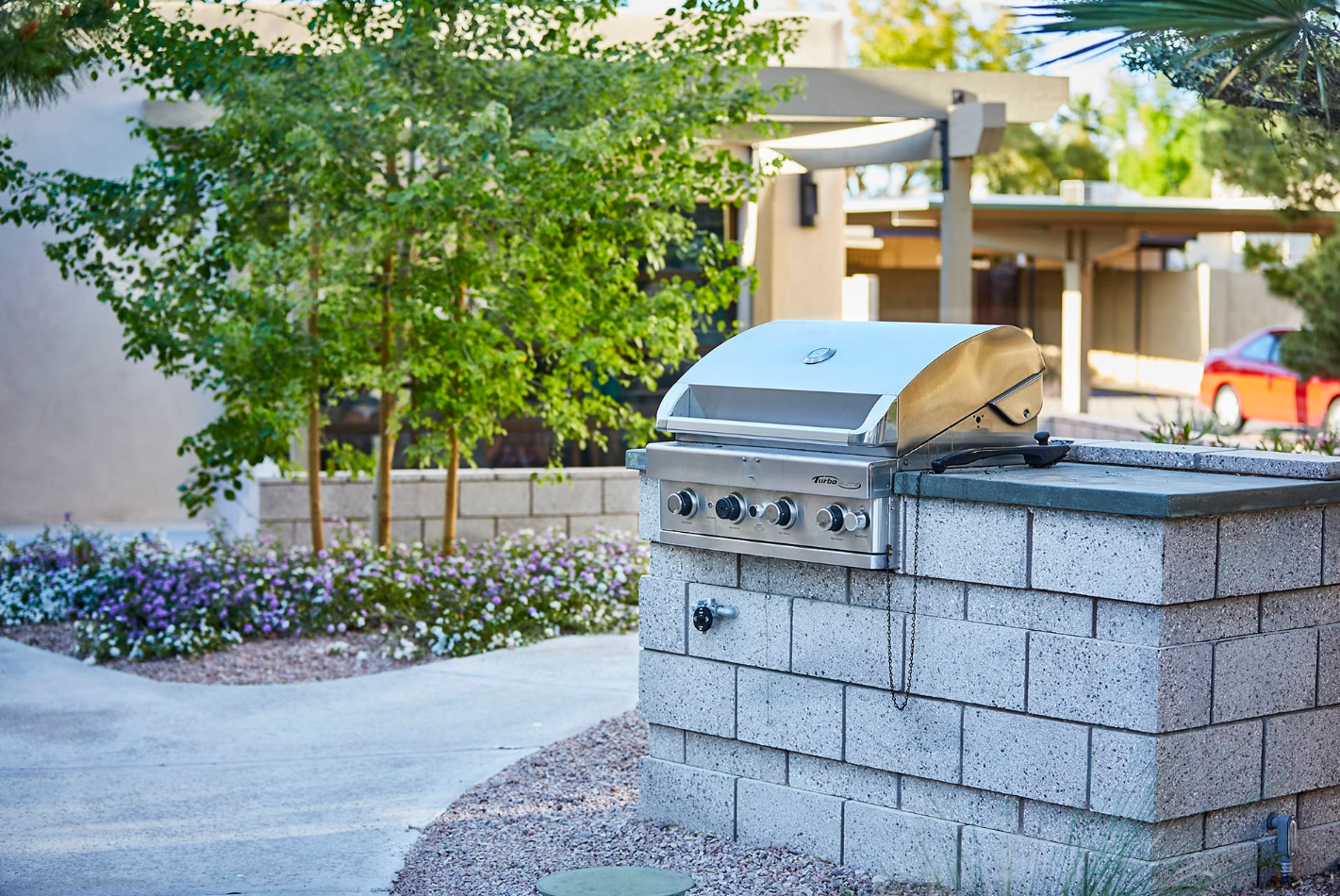 BBQ Grill Along a Paved Path