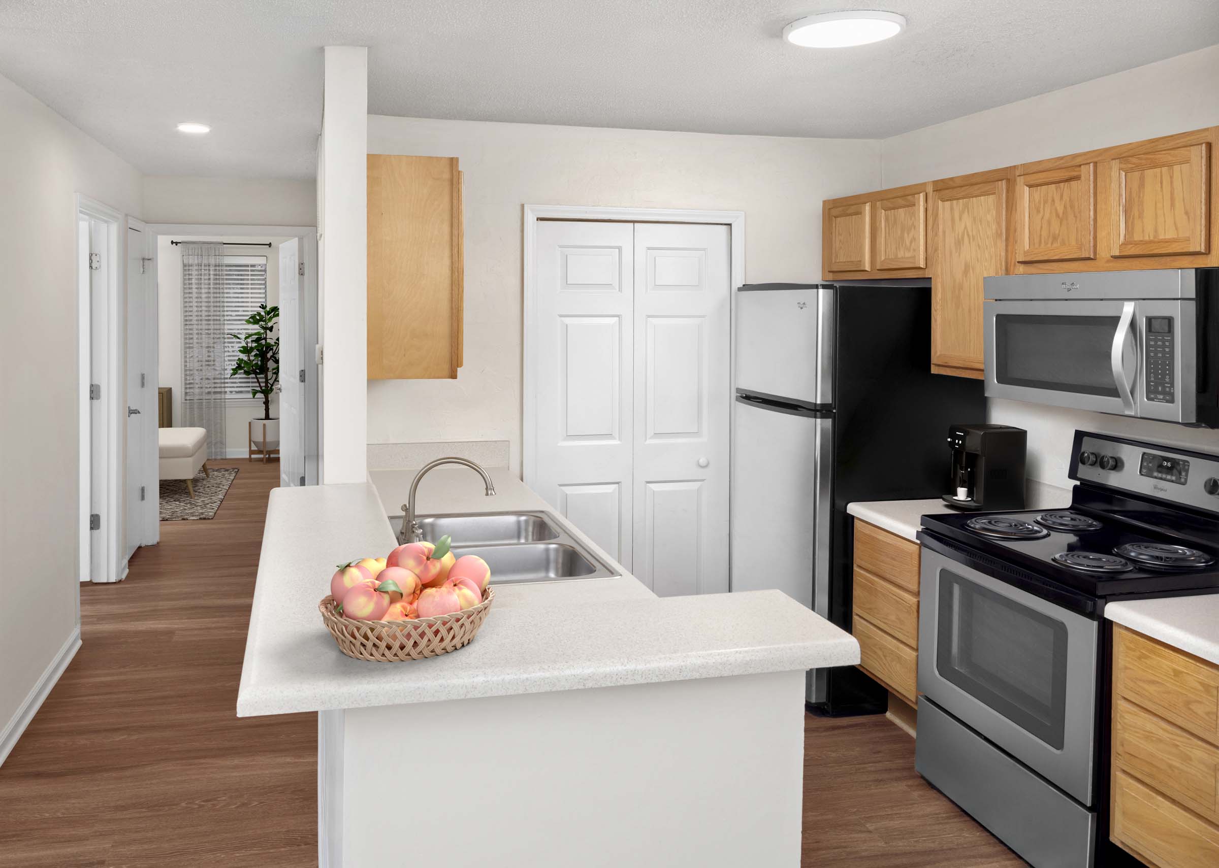 Kitchen with laminate countertops and stainless steel appliances at Camden Touchstone apartments in Charlotte, NC