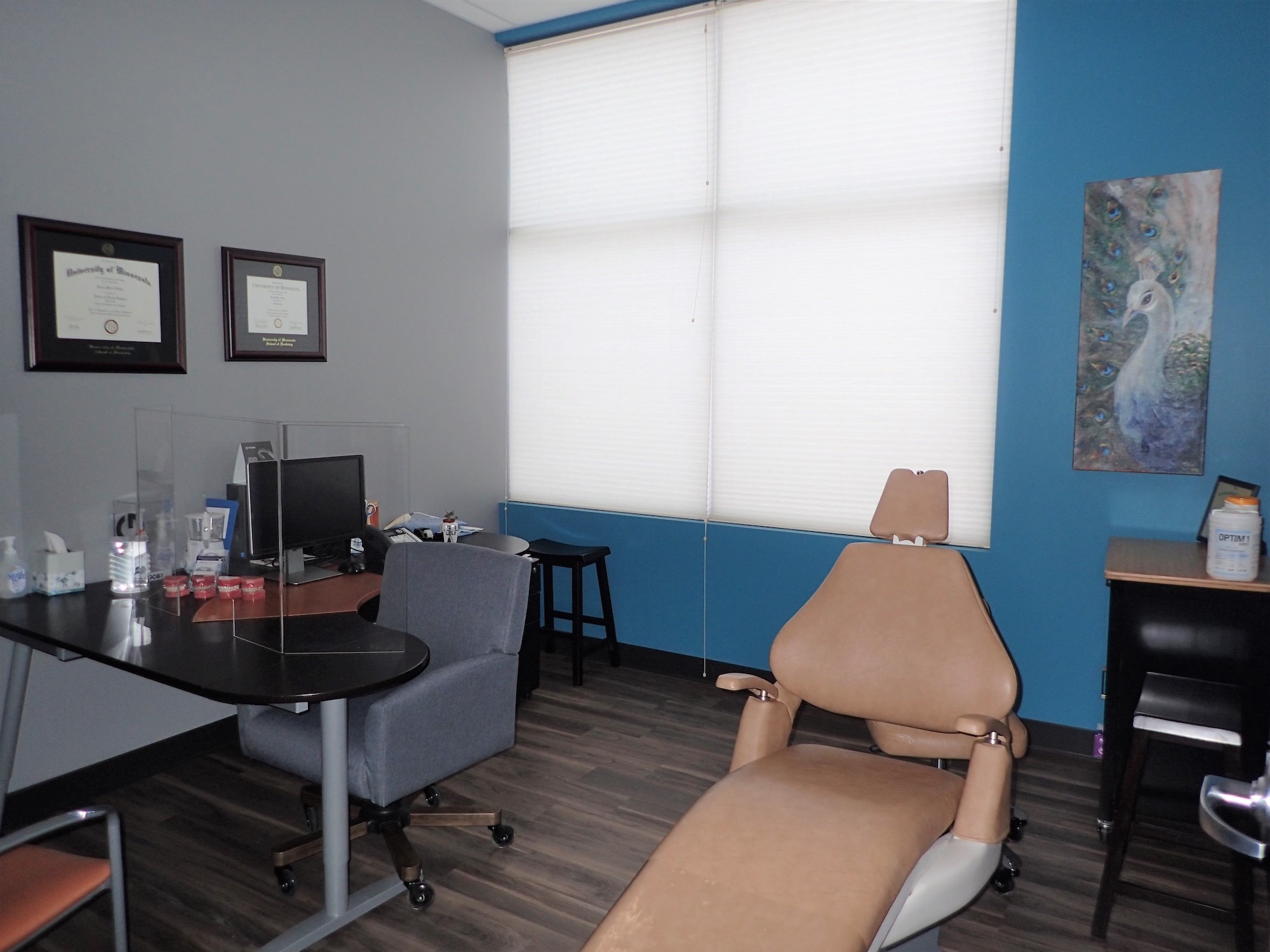 A cozy and comfortable consultation room at Imagine Orthodontics, featuring a modern dental chair and a welcoming workspace.