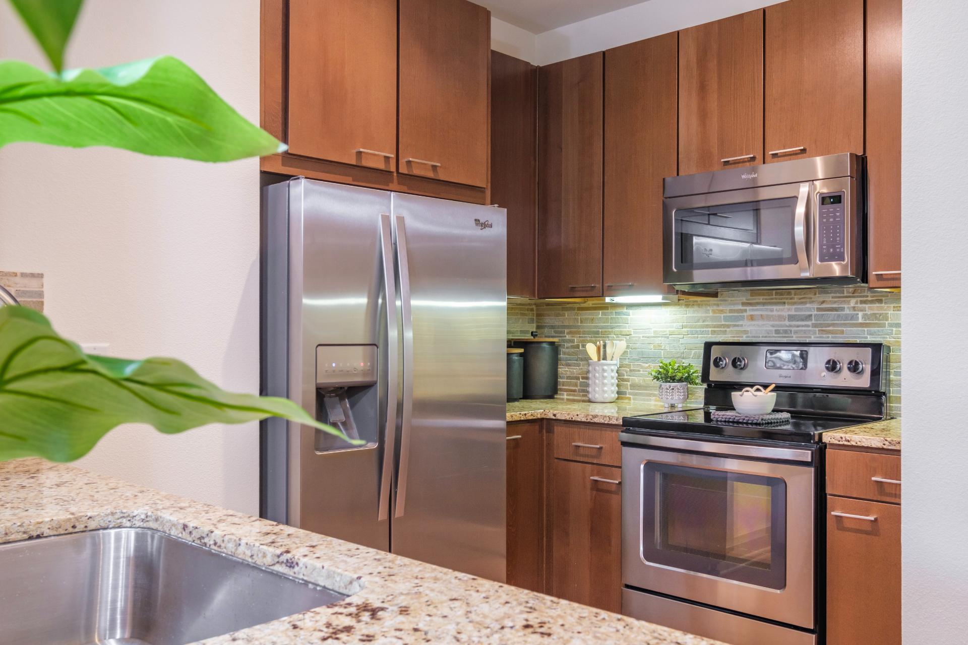 Kitchen With Stainless Steel Appliances Berkshire Medical District Apartments Dallas (469)772-5614