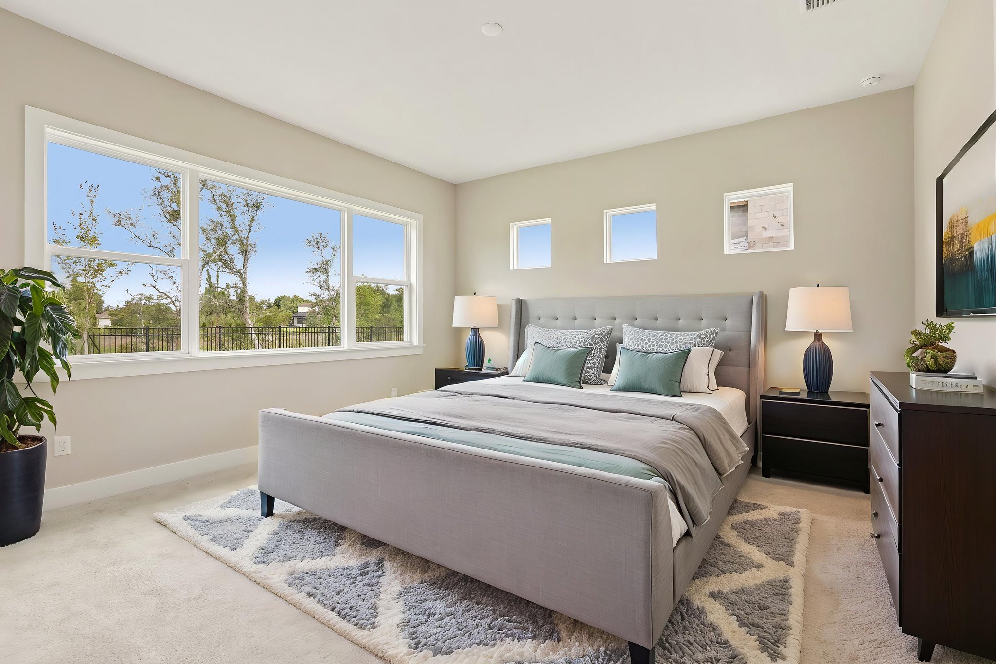 The Primary Bedroom of a DRB Homes Sabal Home Plan at Serengeti in Spring Hill, FL. 