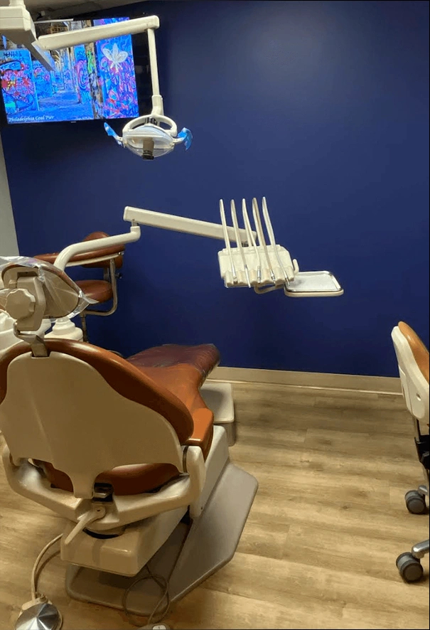 Modern dental treatment room at Vibrant Smiles of Holland with comfortable patient chair and advanced equipment