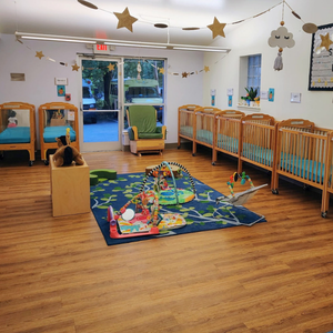 Bright and colorful preschool classroom at Childcare Network with age-appropriate learning materials
