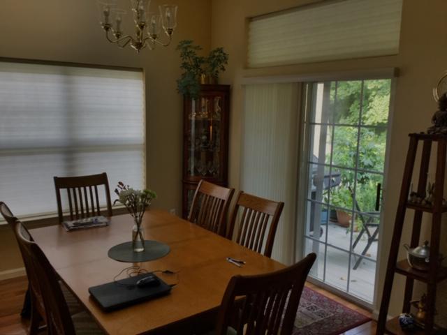 These Honeycomb Shades in Ossining helped with the glare and heat of a sliding glass door without forcing the homeowners to sacrifice the view of the outdoors. #BudgetBlindsOssining #HoneycombShades #ShadesOfBeauty #FreeConsultation #WindowWednesday