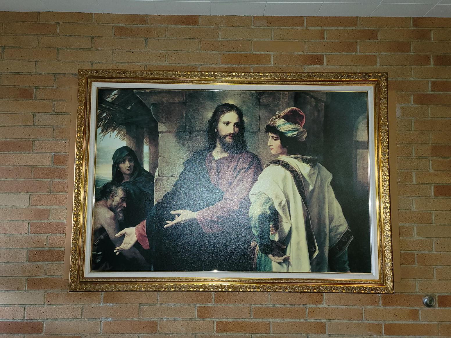 Portrait of Jesus and the rich young man; in the lobby of The Church of Jesus Christ of Latter-day Saints