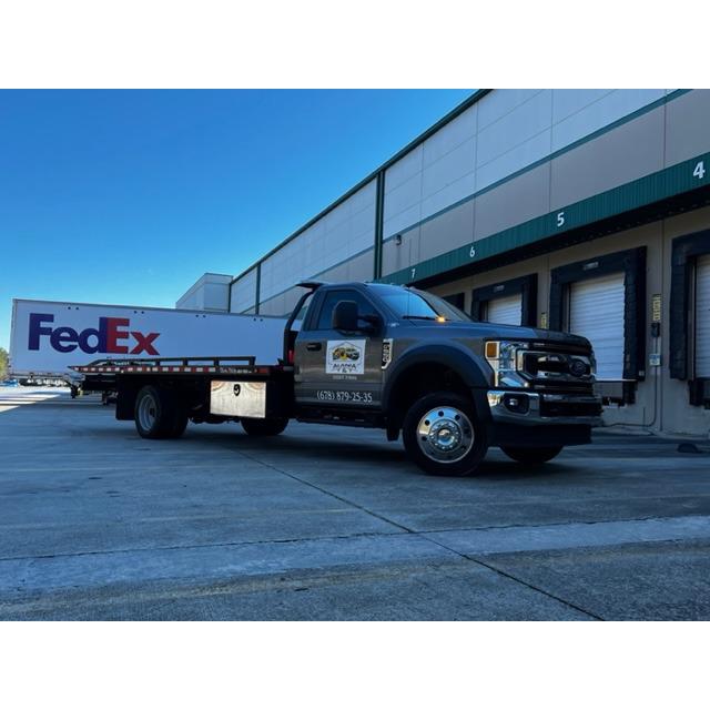 Alania Tow &amp; Transport Logo